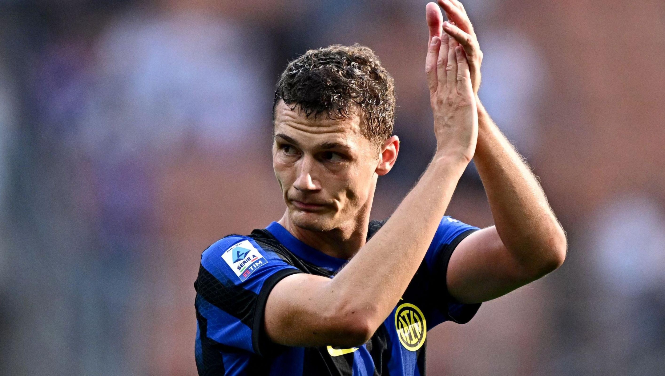 Inter Milan's French defender #28 Benjamin Pavard acknowledges the fans following a 2-2 draw in the Italian Serie A football match between Inter Milan and Bologna at The San Siro Stadium in Milan on October 7, 2023. (Photo by GABRIEL BOUYS / AFP)