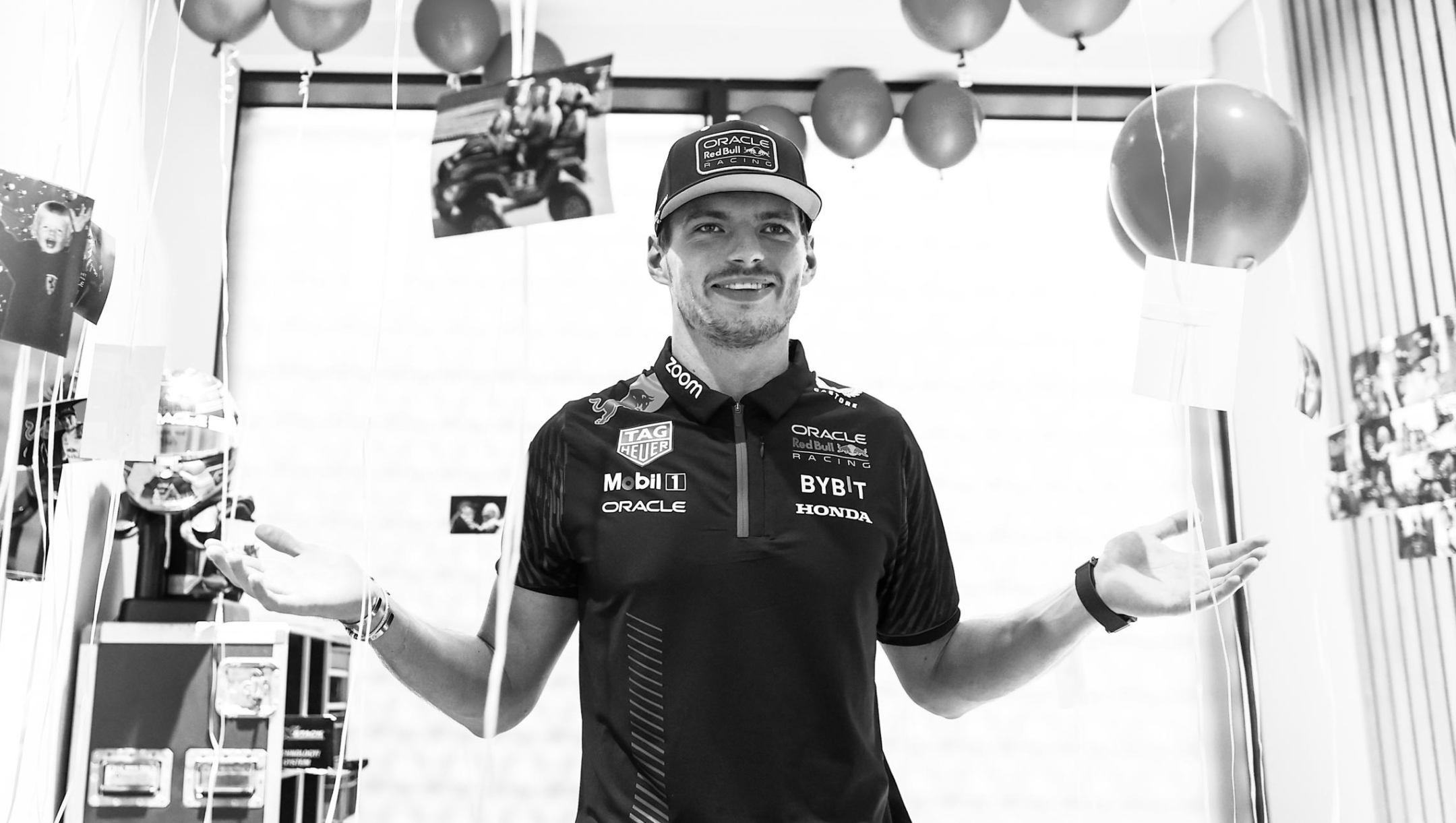 LUSAIL CITY, QATAR - OCTOBER 08: (EDITORS NOTE: Image has been converted to black and white.) 2023 F1 World Drivers Champion Max Verstappen of the Netherlands and Oracle Red Bull Racing poses for a photo in his driver room prior to the F1 Grand Prix of Qatar at Lusail International Circuit on October 08, 2023 in Lusail City, Qatar. (Photo by Mark Thompson/Getty Images)