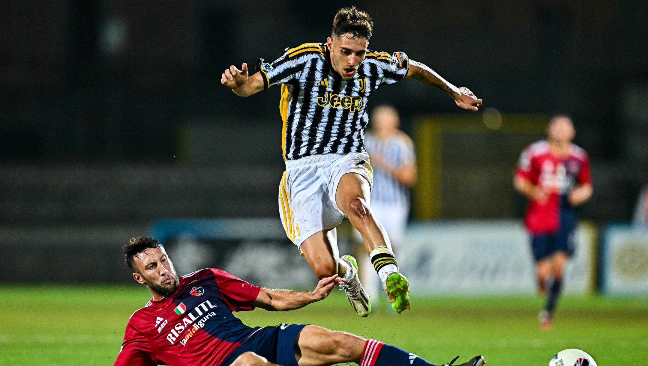 CARRARA, ITALY - OCTOBER 8: Vasco Regini of Sestri Levante (left) and Luis Hasa of Juventus Next Gen vie for the ball during the Serie C match between Sestri Levante and Juventus Next Gen at Stadio dei Marmi on October 8, 2023 in Carrara, Italy. (Photo by Juventus FC/Juventus FC via Getty Images)