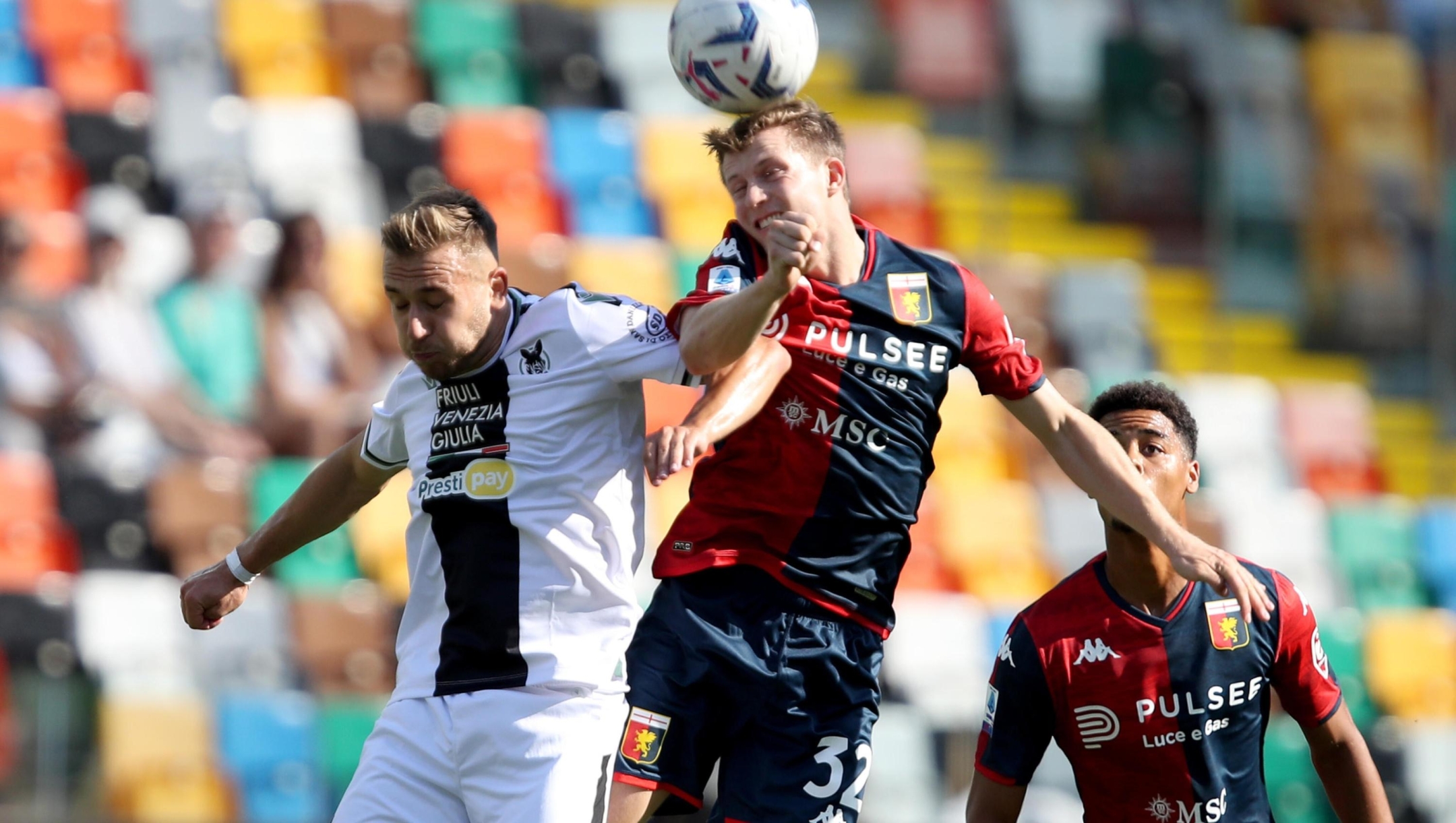 Udinese's Sandi Lovric (L) and Genoa's Morten Frendrup in action during the Italian Serie A soccer match Udinese Calcio vs Genoa CFC at the Friuli - Dacia Arena stadium in Udine, Italy, 1 October 2023. ANSA / GABRIELE MENIS
