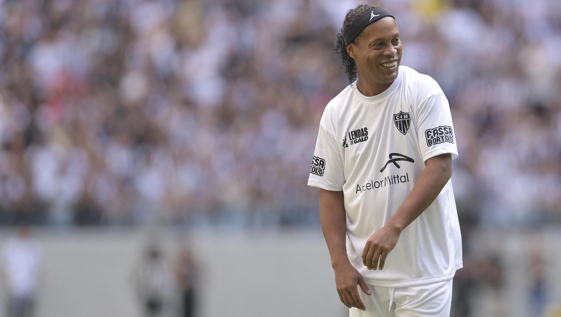 Brazilian ex-football star Ronaldinho Gaucho is pictured during the "Lendas do Galo" match at Arena MRV, the first game at Atletico Mineiro's new stadium in Belo Horizonte, Minas Gerais state, Brazil, on July 16, 2023. (Photo by Douglas Magno / AFP)
