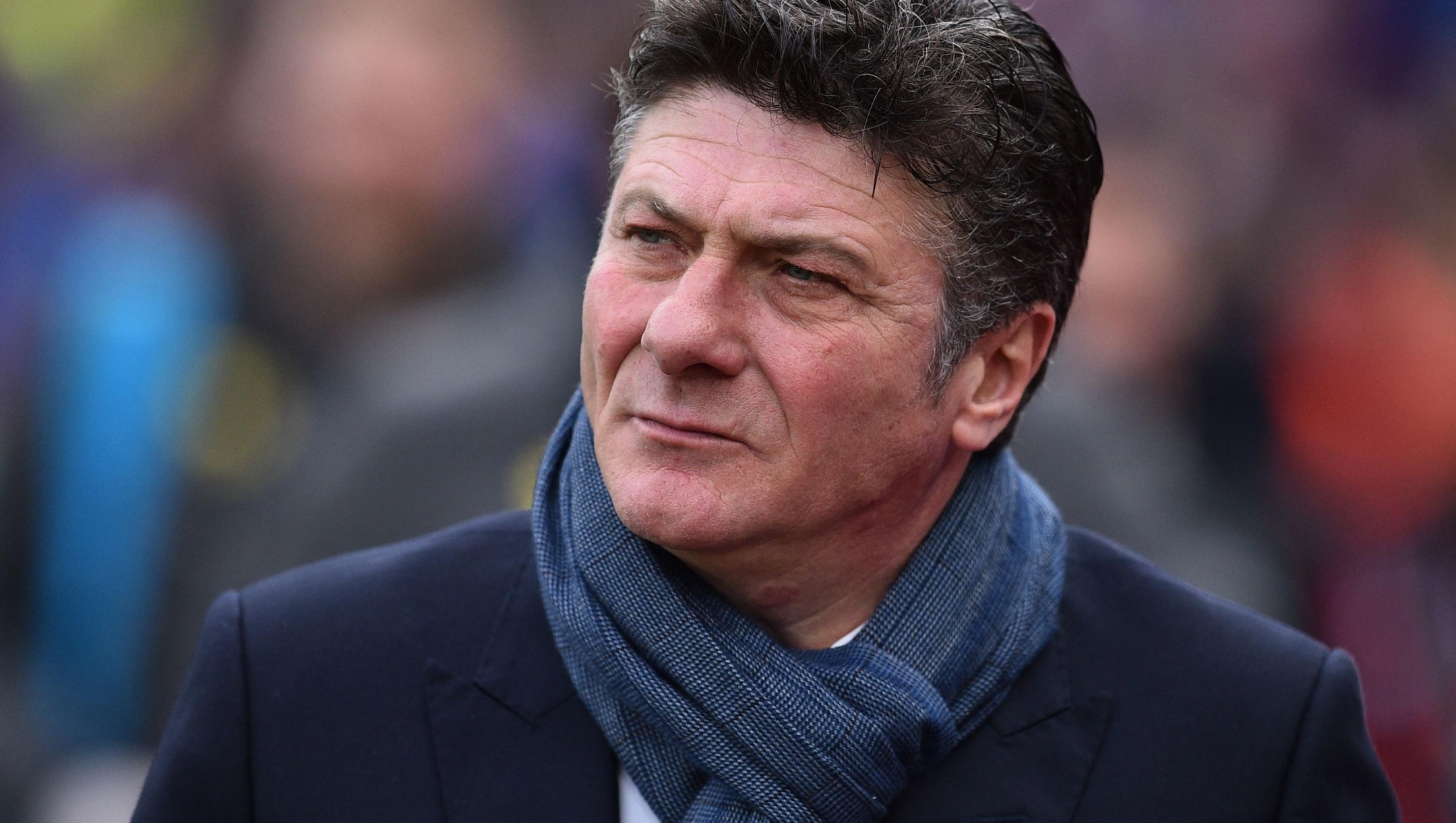 (FILES) Watford's Italian head coach Walter Mazzarri arrives for the English Premier League football match between Crystal Palace and Watford at Selhurst Park in south London on March 18, 2017. Rudi Garcia has been sacked by Napoli, the Italian champions announced on November 14, 2023 after a poor start to the season left their Serie A title defence floundering. Napoli said that Walter Mazzarri returns after a decade to replace Frenchman Garcia, who was dismissed for allowing the team to fall ten points behind league leaders Inter Milan. (Photo by Glyn KIRK / AFP) / RESTRICTED TO EDITORIAL USE. No use with unauthorized audio, video, data, fixture lists, club/league logos or 'live' services. Online in-match use limited to 75 images, no video emulation. No use in betting, games or single club/league/player publications. /