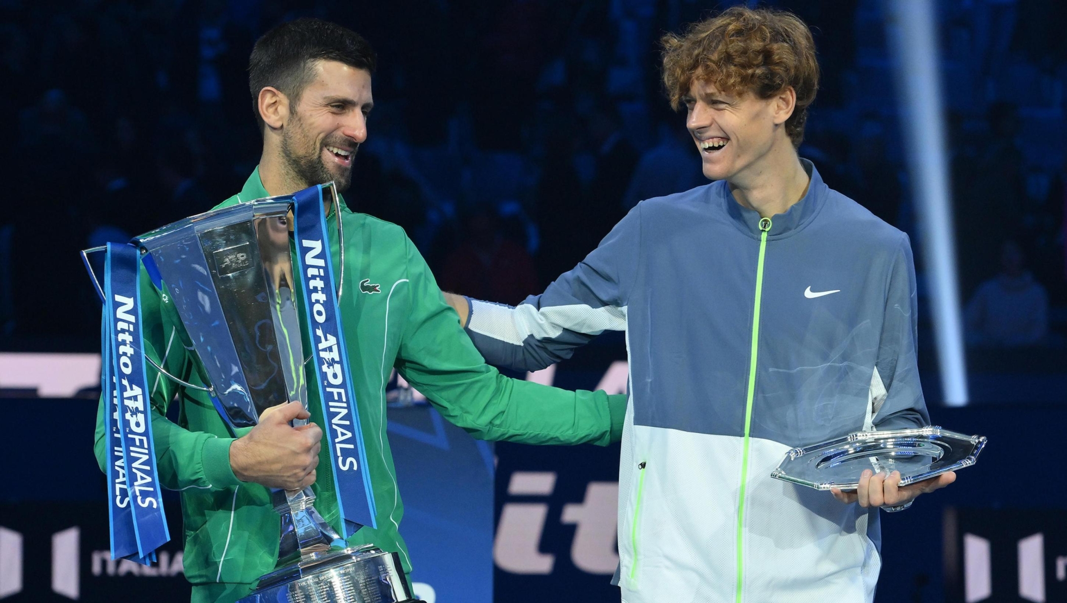Novak Djokovic (L) of Serbia celebrates with the trophy after winning the final against Jannik Sinner (R) of Italy at the Nitto ATP Finals tennis tournament in Turin, Italy, 19 November 2023.  ANSA/ALESSANDRO DI MARCO