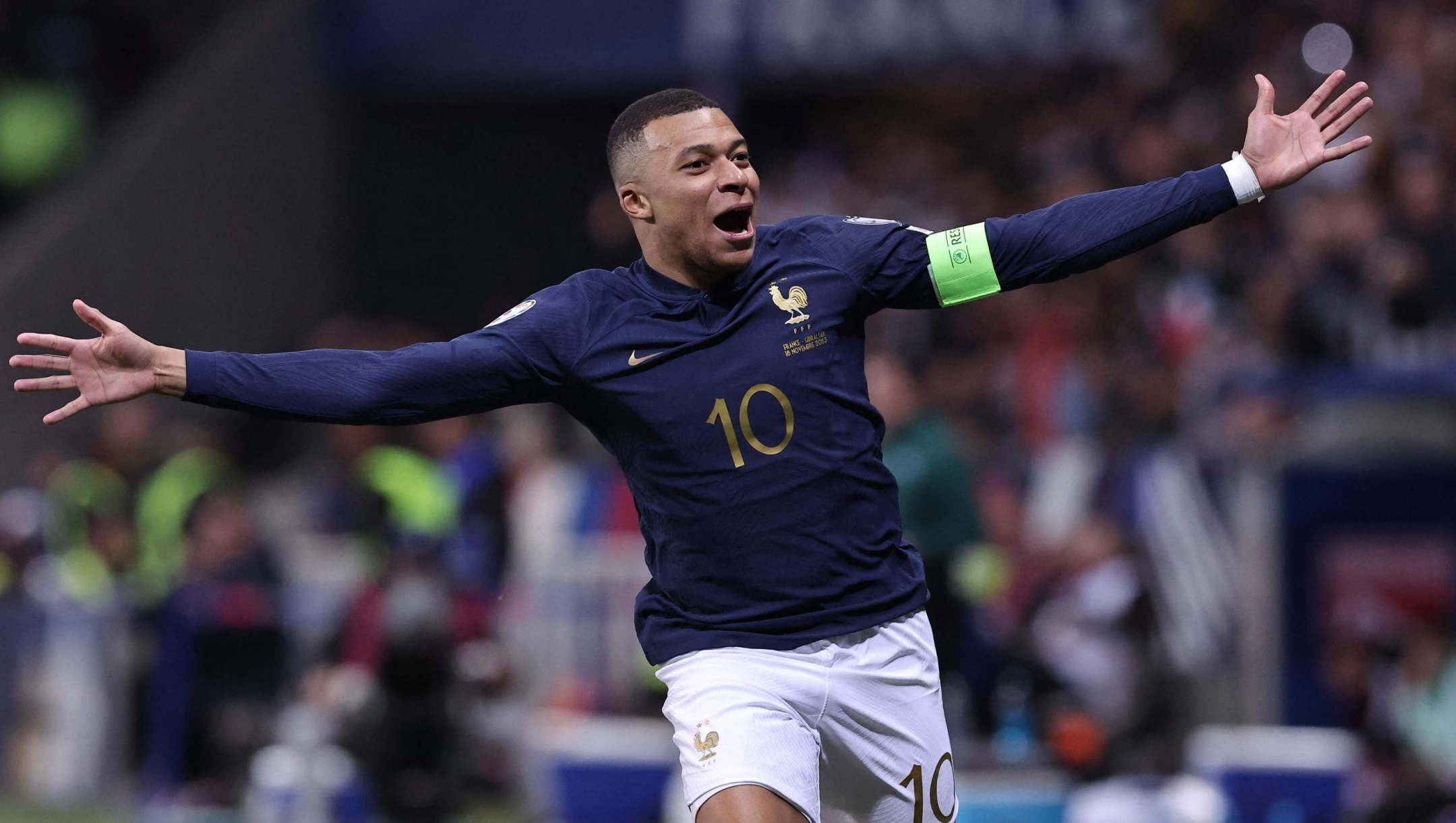TOPSHOT - France's forward #10 Kylian Mbappe celebrates after scoring a goal during the UEFA EURO 2024 Group B qualifying football match between France and Gibraltar at the Allianz Riviera stadium in Nice, southeastern France, on November 18, 2023. (Photo by FRANCK FIFE / AFP)