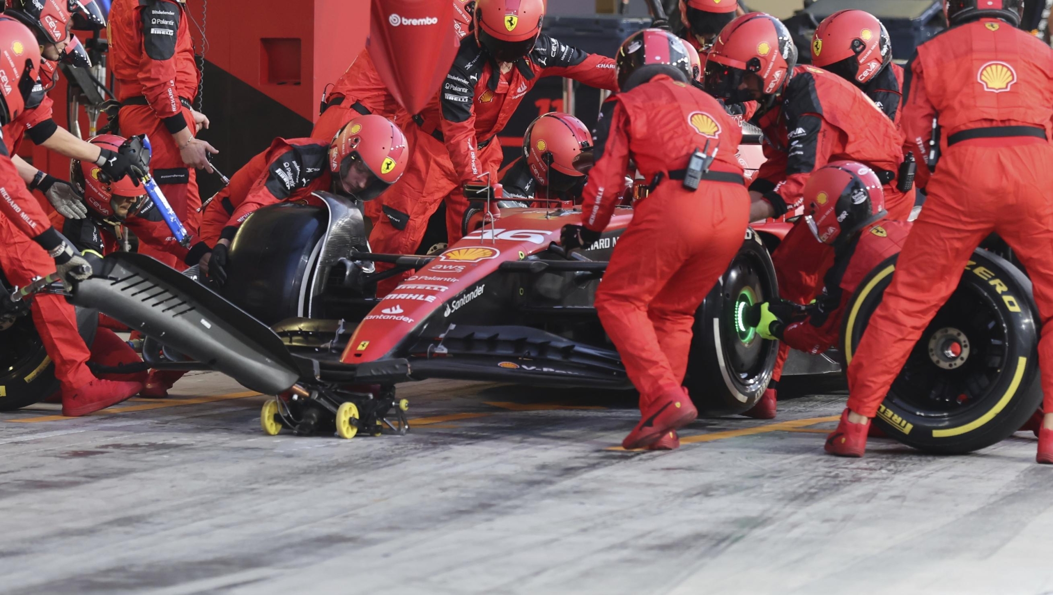 Ferrari driver Charles Leclerc of Monaco gets a pit service during the Abu Dhabi Formula One Grand Prix race at the Yas Marina Circuit, Abu Dhabi, UAE, Sunday, Nov. 26, 2023. (Ali Haider/Pool via AP)