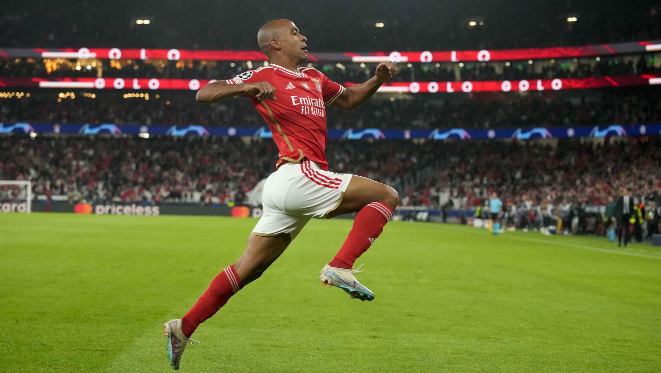 Benfica's Joao Mario celebrates after he scored his side's first goal during the Champions League group D soccer match between SL Benfica and Inter Milano at the Luz stadium in Lisbon, Wednesday, Nov. 29, 2023. (AP Photo/Armando Franca)