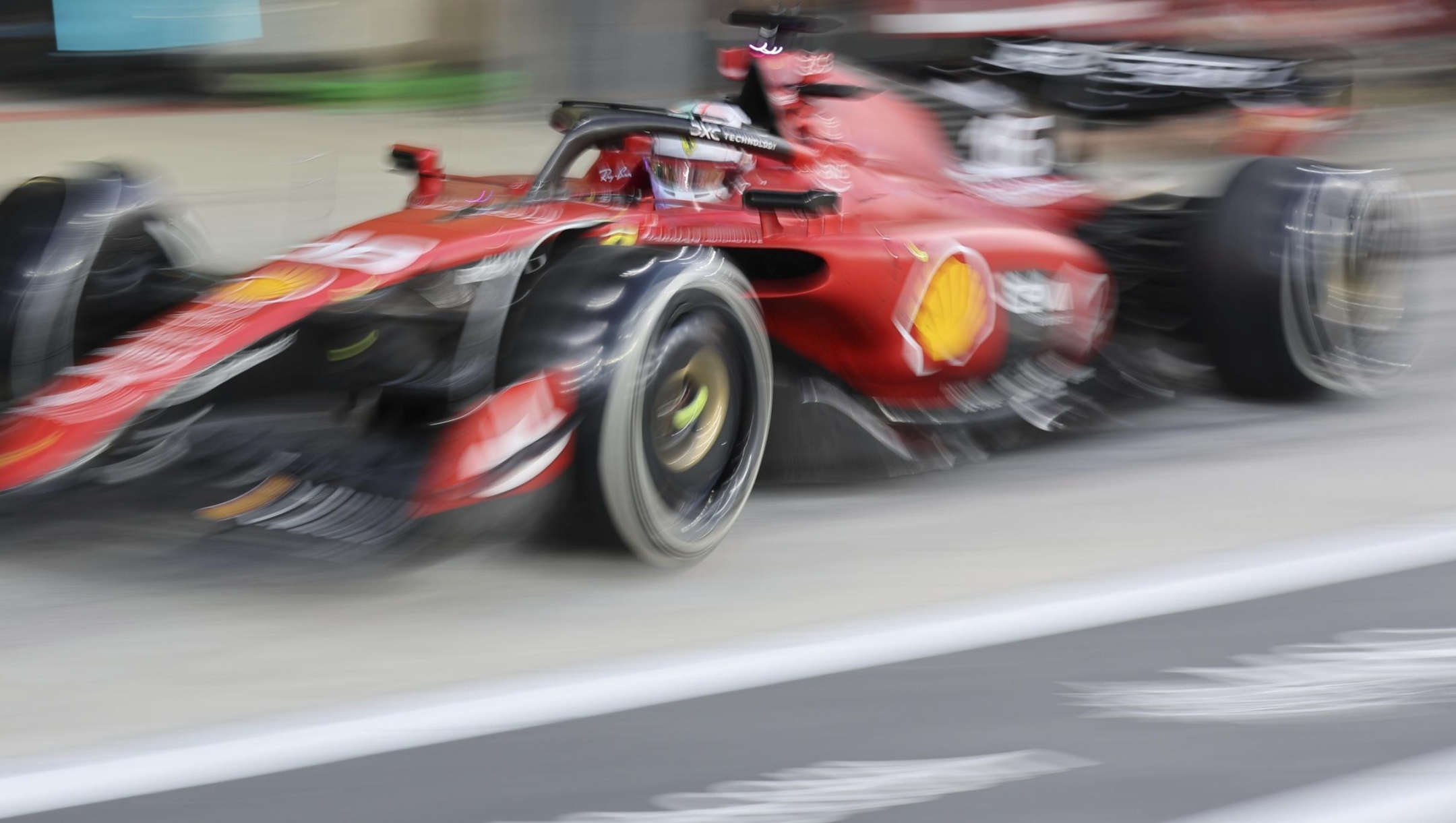 Ferrari driver Charles Leclerc of Monaco steers his car after pit service during the Abu Dhabi Formula One Grand Prix race at the Yas Marina Circuit, Abu Dhabi, UAE, Sunday, Nov. 26, 2023. (Ali Haider/Pool via AP)