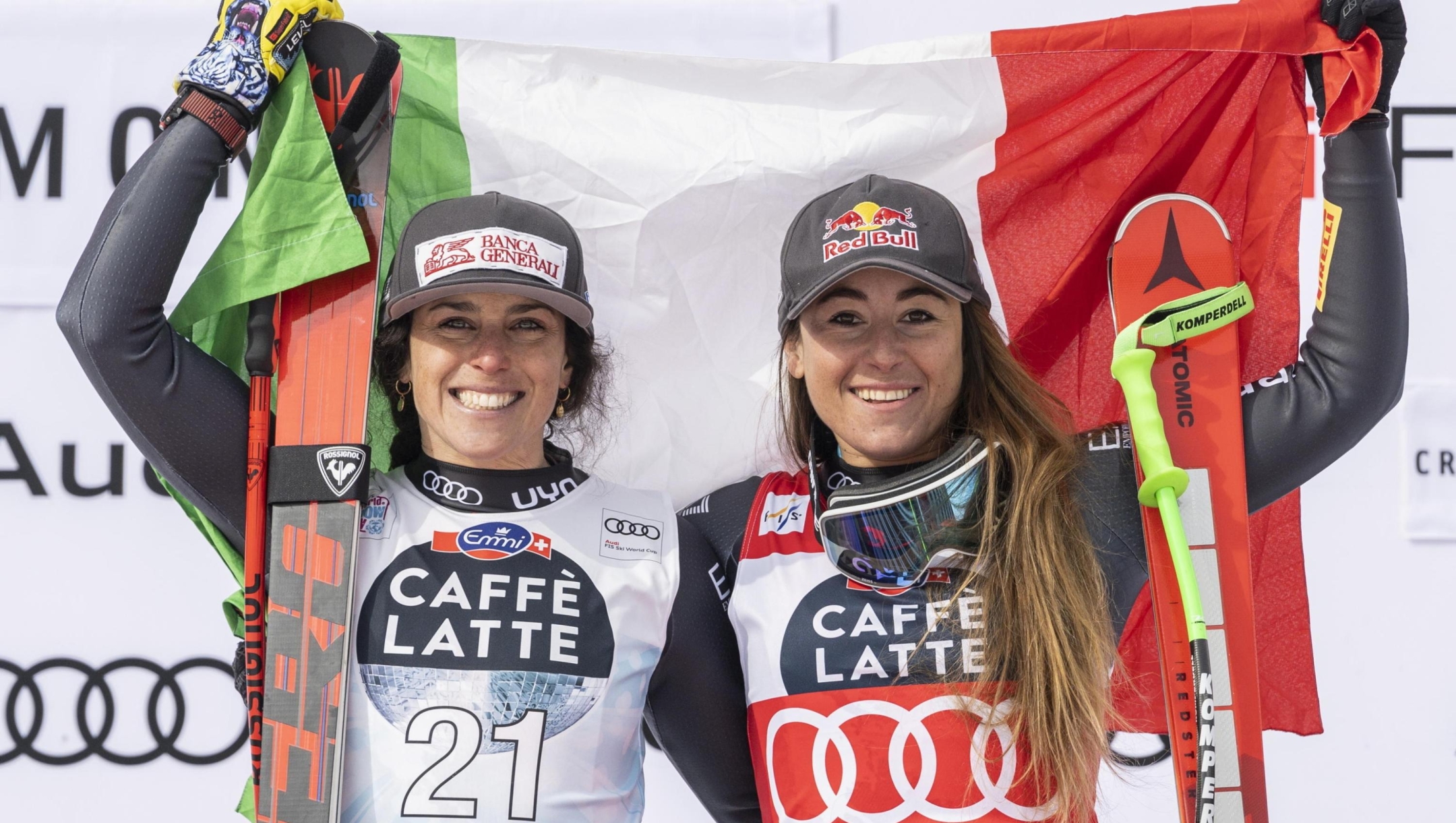 epa10492112 Sofia Goggia of Italy, right, celebrates as the winner with Federica Brignone also of Italy, during the podium ceremony after the women's Downhill race at the FIS Alpine Ski World Cup in Crans-Montana, Switzerland, 26 February 2023.  EPA/ALESSANDRO DELLA VALLE