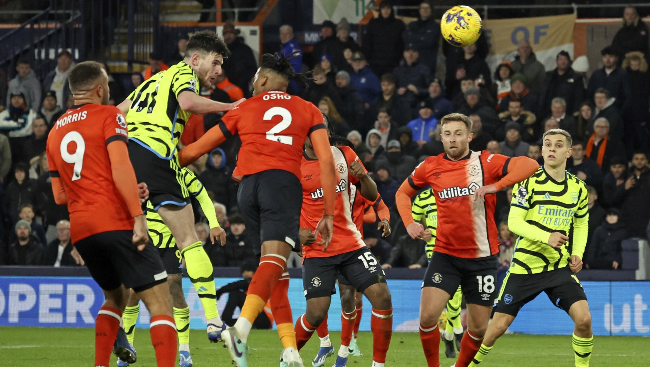 Arsenal's Declan Rice, second left, scores his side's fourth goal during the English Premier League soccer match between Luton and Arsenal at Kenilworth Road, Luton, England, Tuesday, Dec. 5, 2023. (AP Photo/Ian Walton)