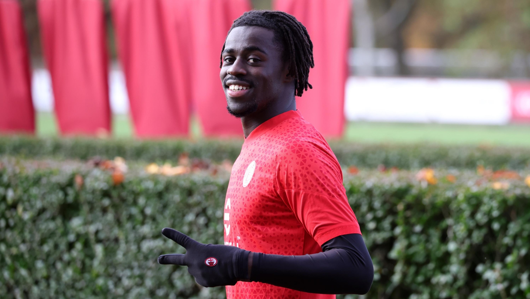 CAIRATE, ITALY - NOVEMBER 16: Clinton Nsiala Makengo of AC Milan smiles during a training session at Milanello on November 16, 2023 in Cairate, Italy. (Photo by Sara Cavallini/AC Milan via Getty Images)
