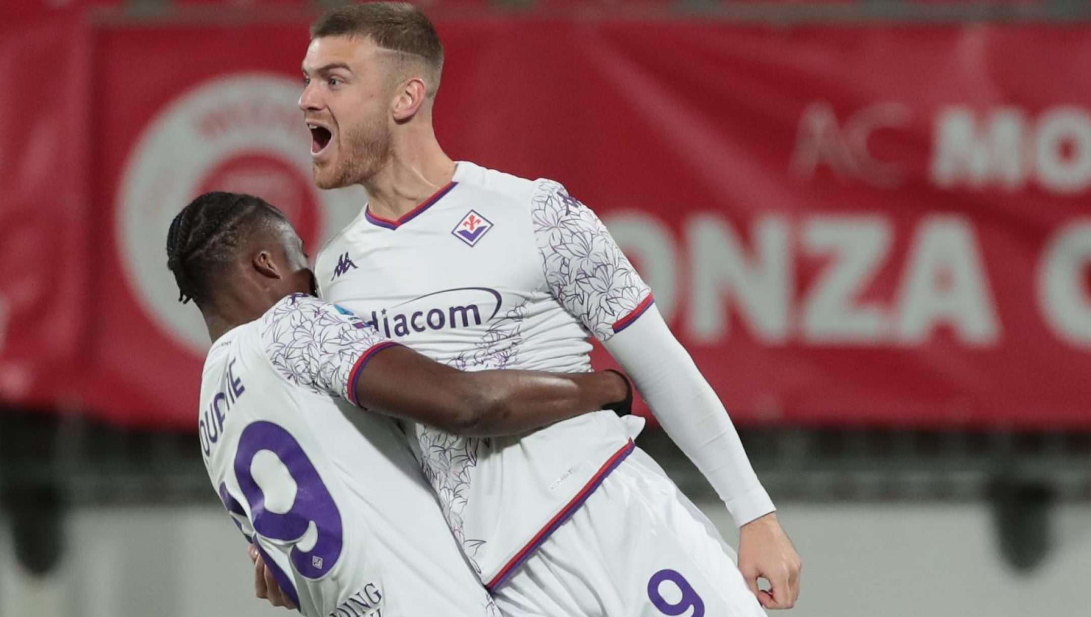 MONZA, ITALY - DECEMBER 22: Lucas Beltran of ACF Fiorentina celebrates with Christian Kouame after scoring the team's first goal during the Serie A TIM match between AC Monza and ACF Fiorentina at U-Power Stadium on December 22, 2023 in Monza, Italy. (Photo by Emilio Andreoli/Getty Images)