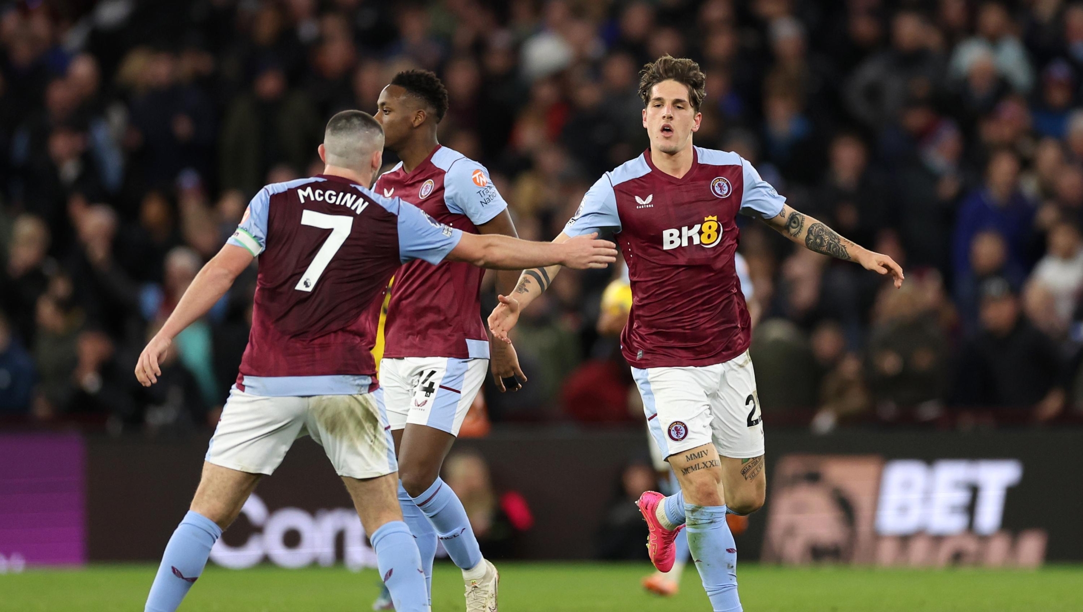 BIRMINGHAM, ENGLAND - DECEMBER 22: Nicolo Zaniolo of Aston Villa celebrates with teammate John McGinn after scoring their team's first goal during the Premier League match between Aston Villa and Sheffield United at Villa Park on December 22, 2023 in Birmingham, England. (Photo by Catherine Ivill/Getty Images)