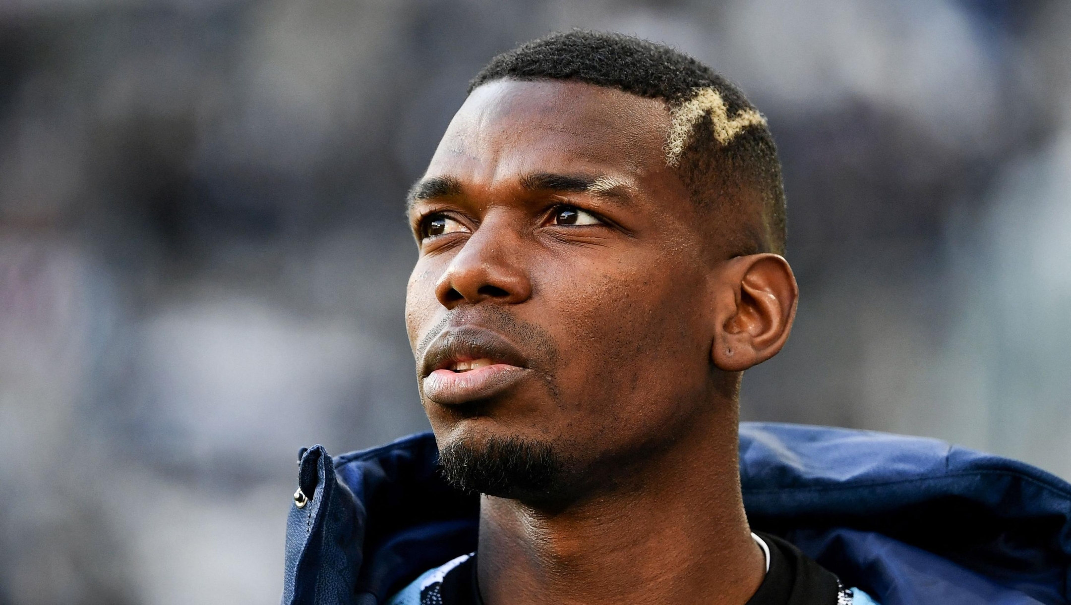 (FILES) Juventus' French midfielder Paul Pogba looks on prior to the Italian Serie A football match between Juventus and Monza at the Juventus Stadium in Turin on January 29, 2023. France's World Cup winner Paul Pogba is facing the possibility of a lengthy ban after Italy's national anti-doping tribunal called for a four-year suspension for the Juventus midfielder, a club source told AFP on December 7, 2023. (Photo by Isabella BONOTTO / AFP)