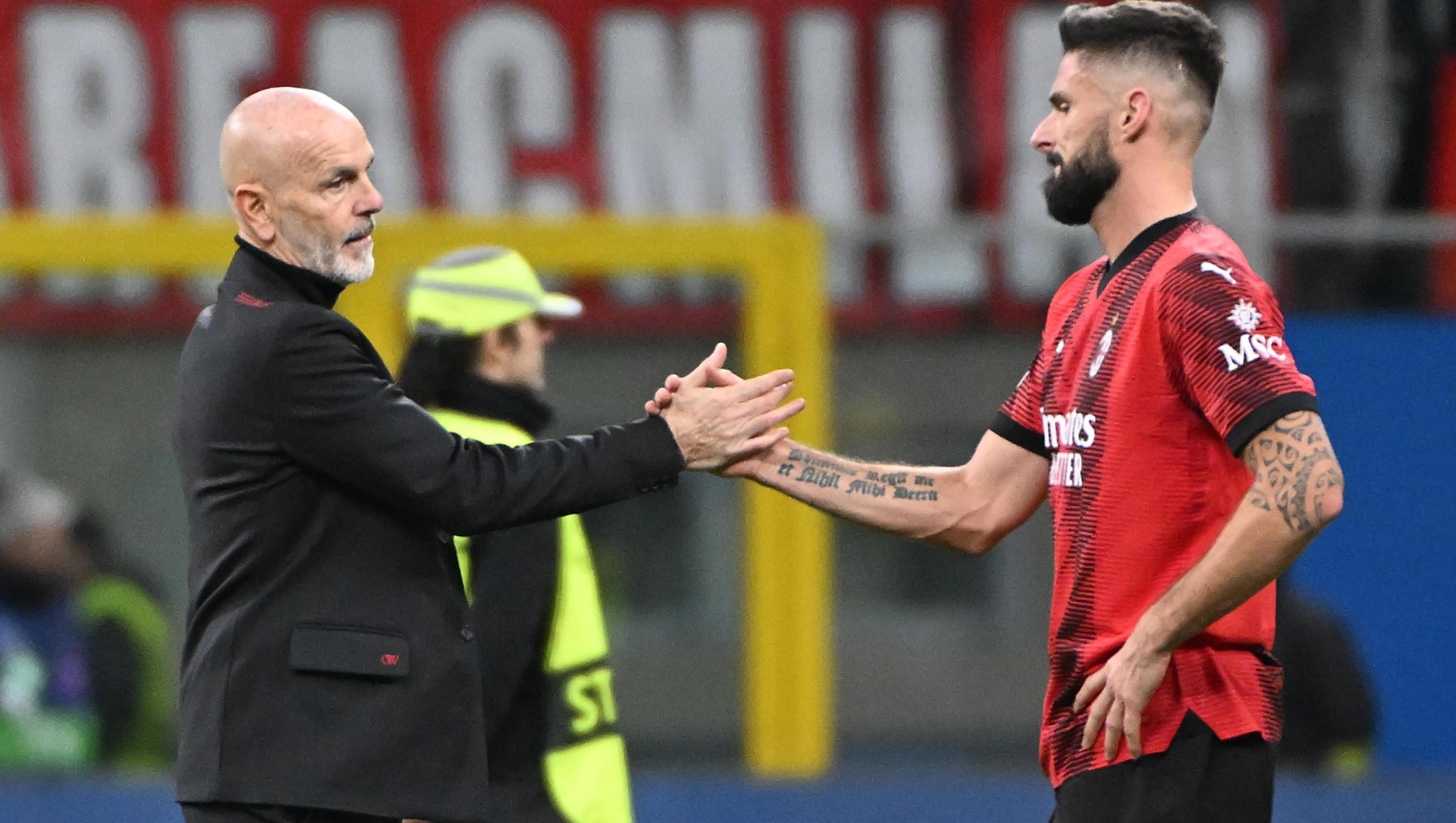 AC Milan’s hwad coach Stefano Pioli and forward Olivier Giroud show their dejection at the end of the Uefa Champions League group F stage soccer match between AC MIlan and Borussia Dortmund at the Giuseppe Meazza stadium in MIlan, Italy, 28 Novembre 2023. ANSA/DANIEL DAL ZENNARO