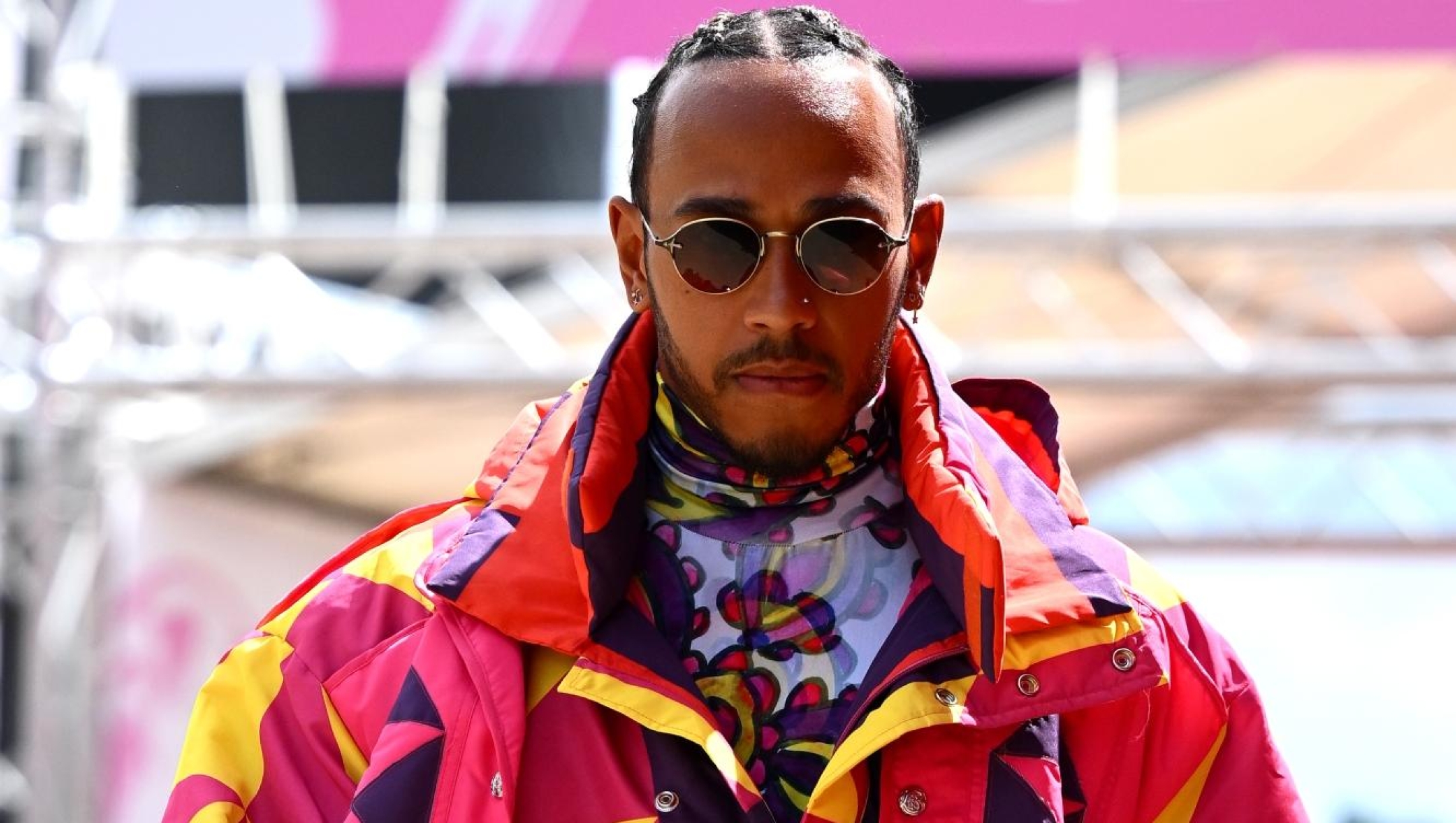 NORTHAMPTON, ENGLAND - JUNE 30: Lewis Hamilton of Great Britain and Mercedes walks in the Paddock during previews ahead of the F1 Grand Prix of Great Britain at Silverstone on June 30, 2022 in Northampton, England. (Photo by Clive Mason/Getty Images)