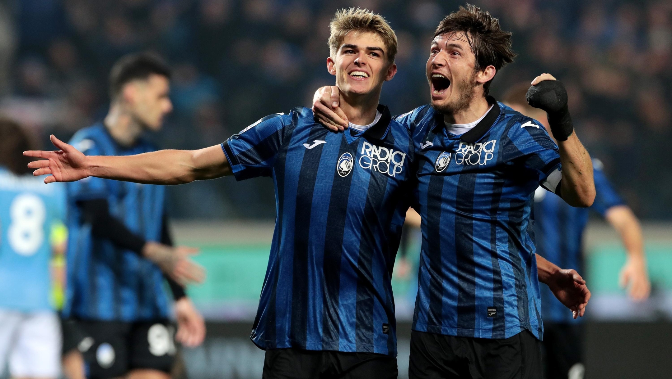 BERGAMO, ITALY - FEBRUARY 04: Charles De Ketelaere of Atalanta BC celebrates with Marten de Roon of Atalanta BC after scoring his team's third goal during the Serie A TIM match between Atalanta BC and SS Lazio at Gewiss Stadium on February 04, 2024 in Bergamo, Italy. (Photo by Emilio Andreoli/Getty Images)