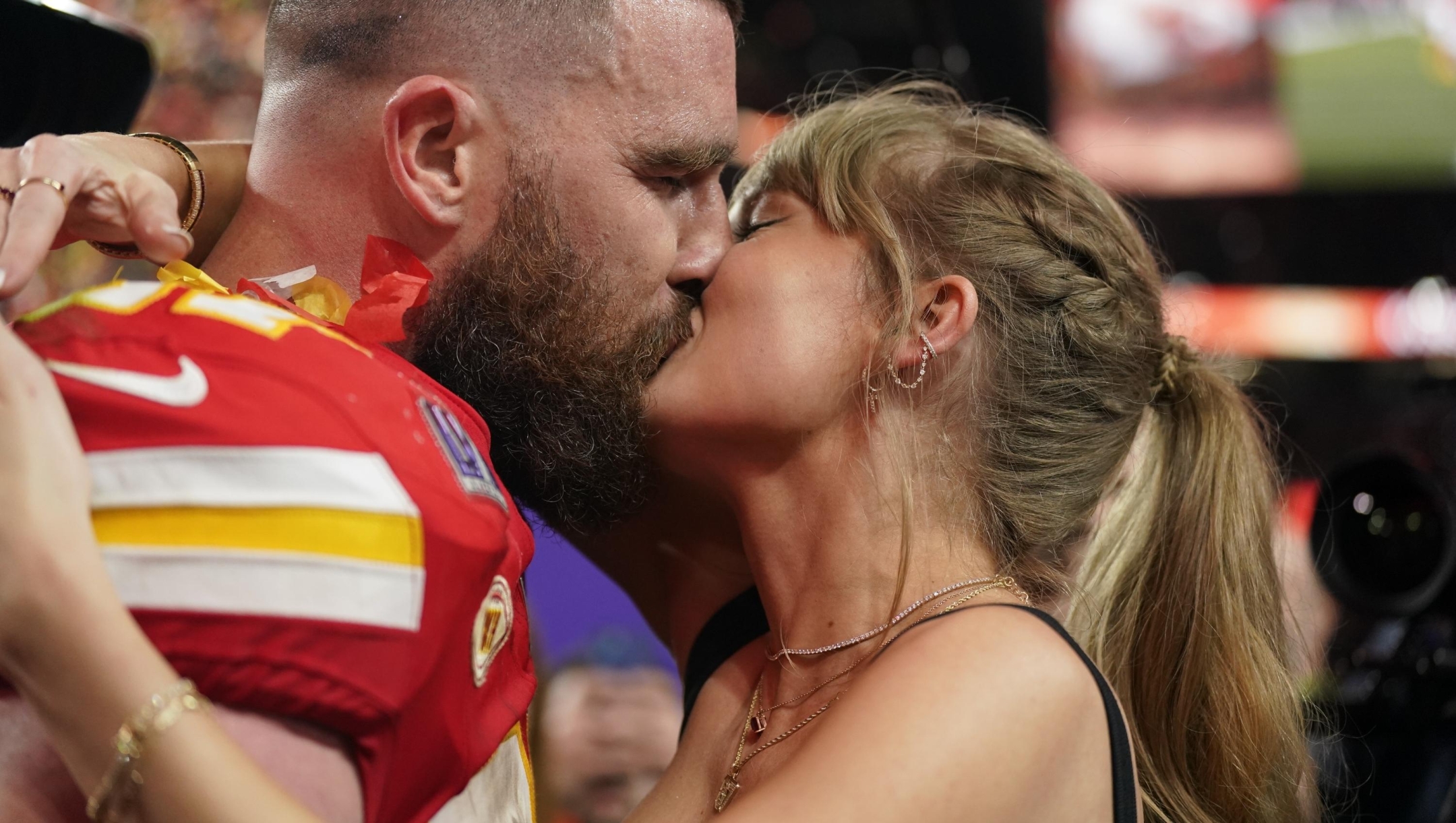 Taylor Swift kisses Kansas City Chiefs tight end Travis Kelce after the NFL Super Bowl 58 football game against the San Francisco 49ers, Sunday, Feb. 11, 2024, in Las Vegas. The Chiefs won 25-22 against the 49ers. (AP Photo/Brynn Anderson)