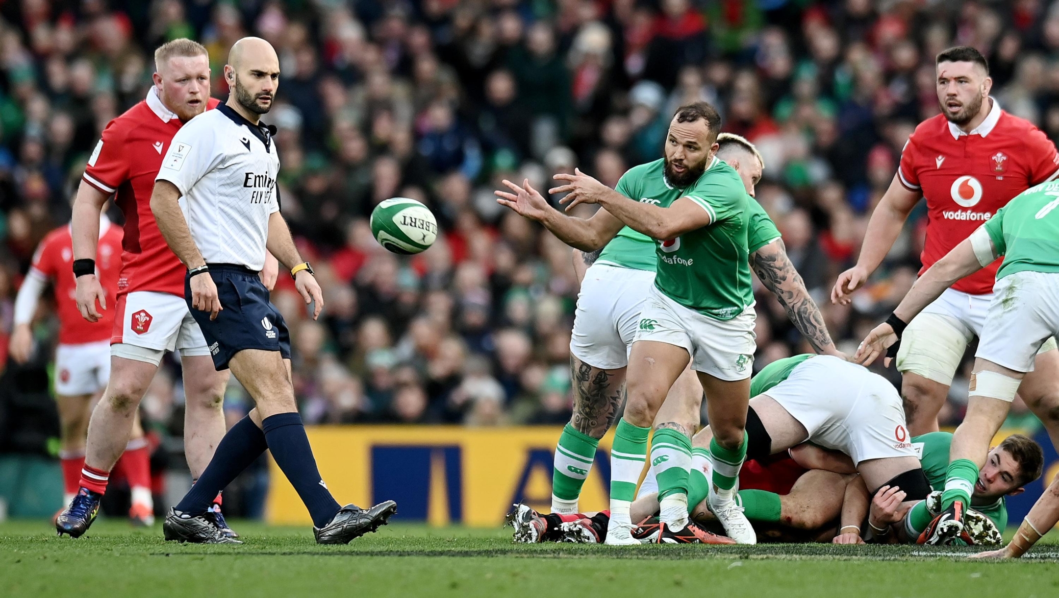 DUBLIN, IRELAND - FEBRUARY 24: Jamison Gibson-Park of Ireland passes the ball out of the ruck during the Guinness Six Nations 2024 match between Ireland and Wales at the Aviva Stadium on February 24, 2024 in Dublin, Ireland. (Photo by Charles McQuillan/Getty Images)