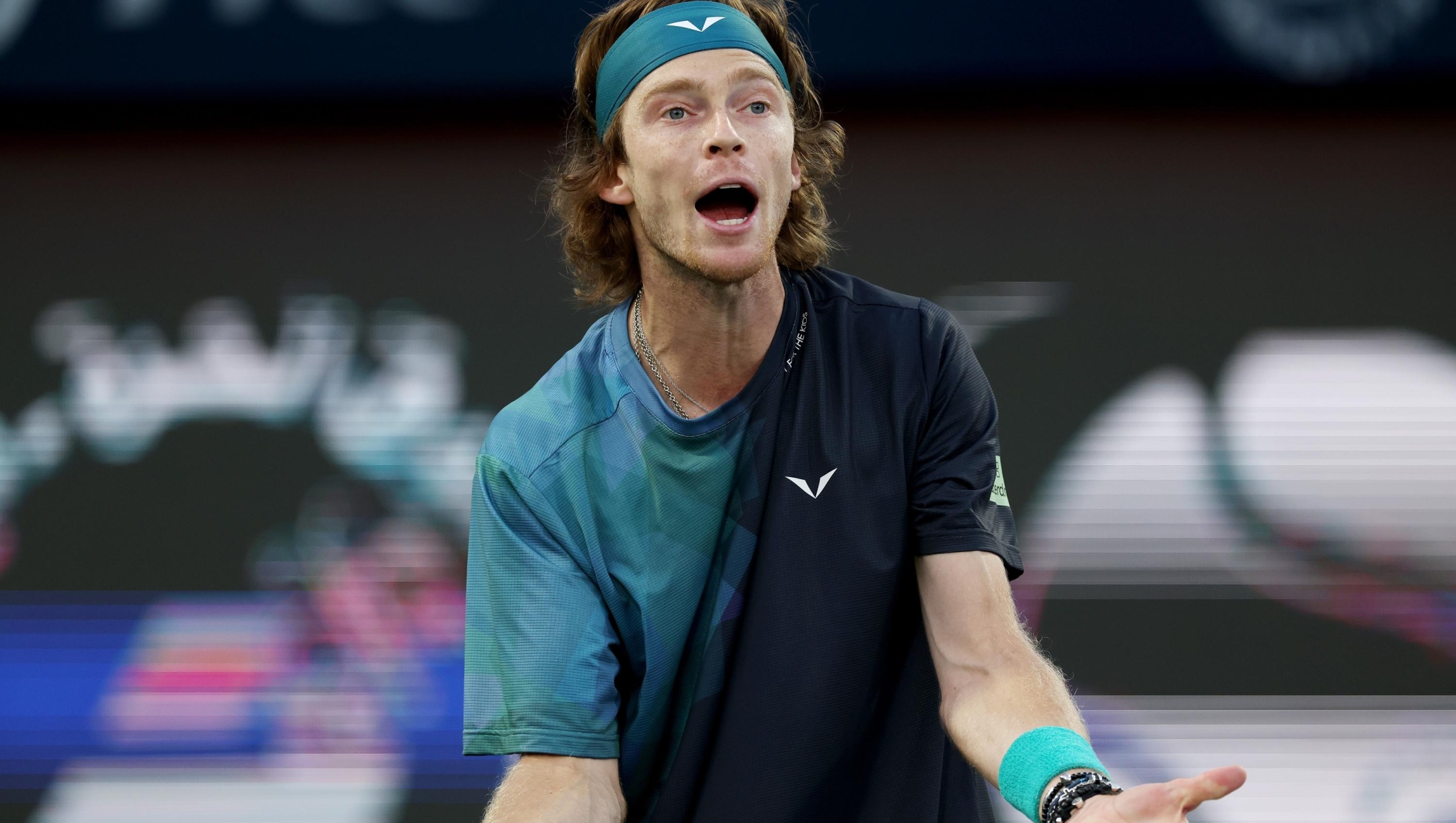 DUBAI, UNITED ARAB EMIRATES - MARCH 01: Andrey Rublev reacts while playing against Alexander Bublik of Kazakhstan in their semifinal match during the Dubai Duty Free Tennis Championships at Dubai Duty Free Tennis Stadium on March 01, 2024 in Dubai, United Arab Emirates. (Photo by Christopher Pike/Getty Images)