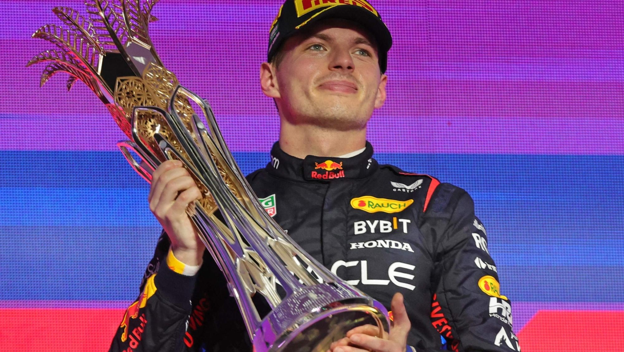 Red Bull Racing's Dutch driver Max Verstappen celebrates winning the Saudi Arabian Formula One Grand Prix during the podium ceremony at the Jeddah Corniche Circuit in Jeddah on March 9, 2024. (Photo by Giuseppe CACACE / AFP)