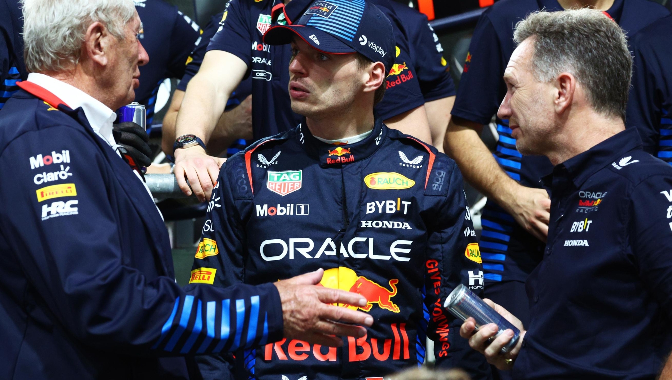 JEDDAH, SAUDI ARABIA - MARCH 09: Race winner Max Verstappen of the Netherlands and Oracle Red Bull Racing speaks with Oracle Red Bull Racing Team Principal Christian Horner and Oracle Red Bull Racing Team Consultant Dr Helmut Marko in parc ferme during the F1 Grand Prix of Saudi Arabia at Jeddah Corniche Circuit on March 09, 2024 in Jeddah, Saudi Arabia. (Photo by Clive Rose/Getty Images)