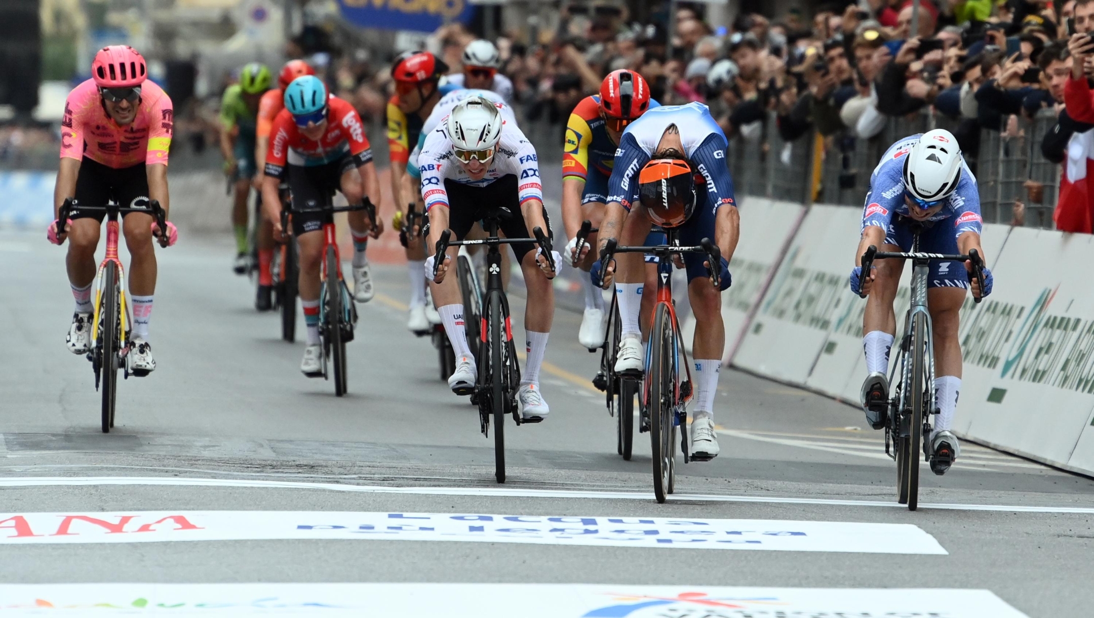 PHILIPSEN Jasper sprints to the finish line ahead of MATTHEWS Michael to win the men's elite race of the Milano -Sanremo one day cycling race (288km) from Pavia and to Sanremo - North West Italy- Saturday, March 16, 2024. Sport - cycling . (Photo by Gian Mattia D'Alberto/Lapresse)