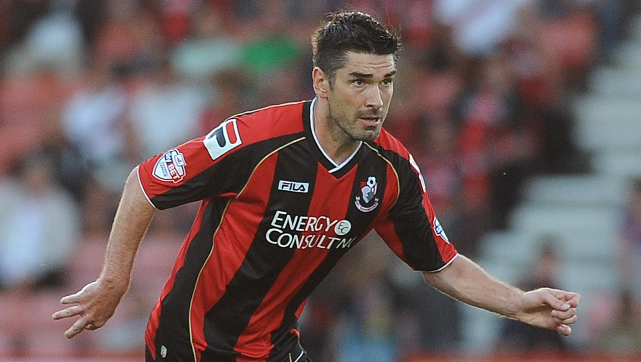 BOURNEMOUTH, ENGLAND - AUGUST 06: Richard Hughes of Bournemouth attacks during the Capital One Cup First Round match between AFC Bournemouth and Portsmouth at The Goldsands Stadium on August 06, 2013 in Bournemouth, England, (Photo by Charlie Crowhurst/Getty Images) *** Local Caption *** Richard Hughes