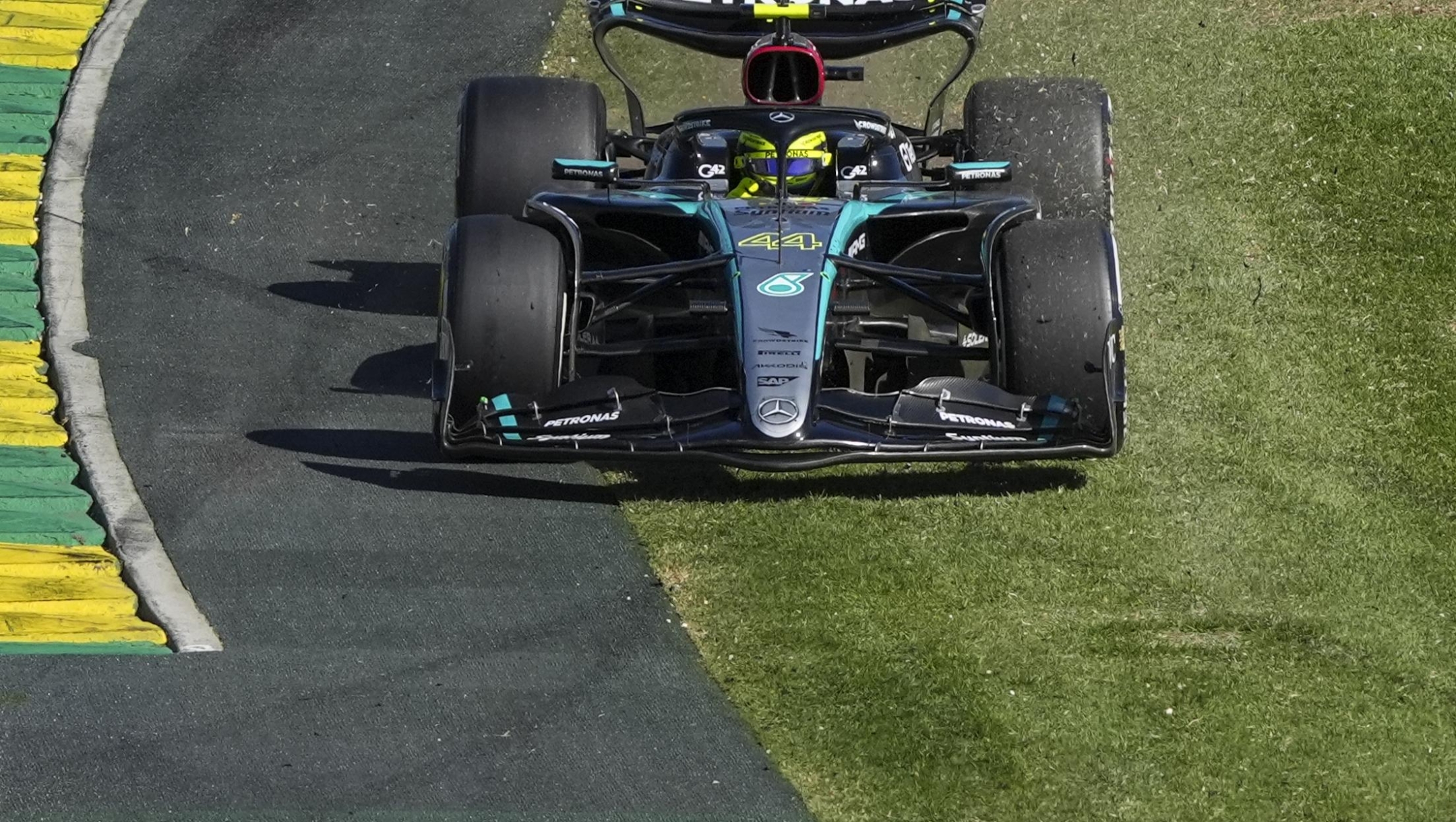 Mercedes driver Lewis Hamilton of Britain goes off the track during the Australian Formula One Grand Prix at Albert Park, in Melbourne, Australia, Sunday, March 24, 2024. (AP Photo/Asanka Brendon Ratnayake)