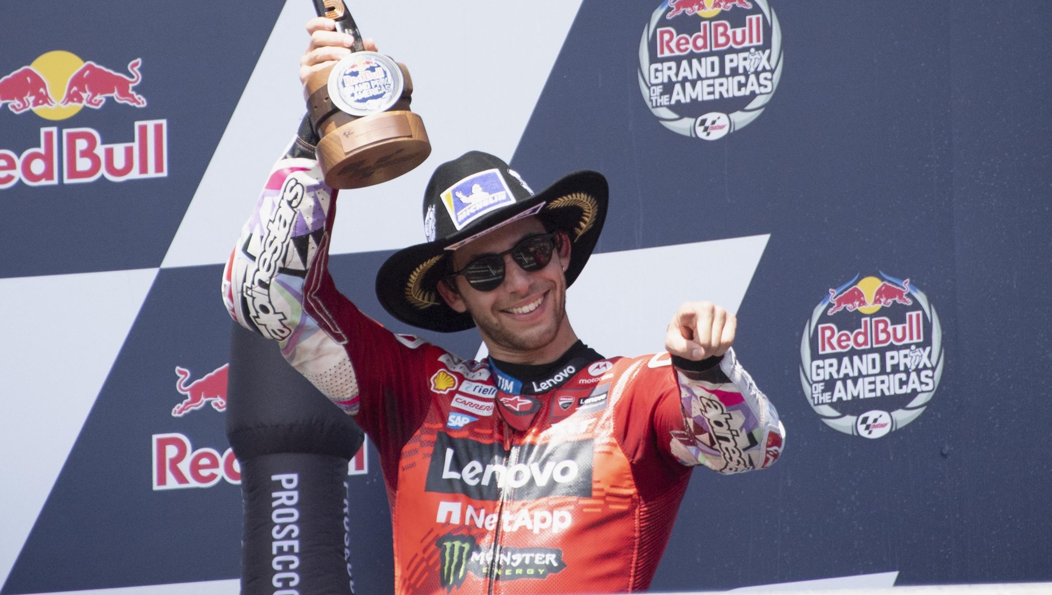 AUSTIN, TEXAS - APRIL 14: Enea Bastianini of Italy and Ducati Lenovo Team celebrates the third place on the podium during the MotoGP Race during the MotoGP Of The Americas - Race on April 14, 2024 in Austin, Texas.   Mirco Lazzari gp/Getty Images/AFP (Photo by Mirco Lazzari gp / GETTY IMAGES NORTH AMERICA / Getty Images via AFP)