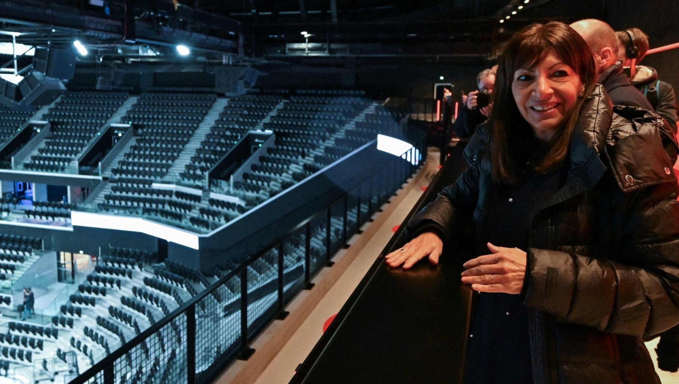 Mayor of Paris Anne Hidalgo looks on during the inauguration of the Arena Porte de La Chapelle in Paris on February 11, 2024. The only new sports venue built in inner Paris for the Olympics this year, which will be used for gymnastics and badminton, opens its doors on February 11, 2024 in an area of the capital hoping to shed its reputation for crack-dealing and crime. The 8,000-seat Arena Porte de la Chapelle, which sits just inside the capital's ring road, is a key part of regeneration efforts centred on one of Paris's most deprived neighbourhoods. (Photo by Miguel MEDINA / POOL / AFP)