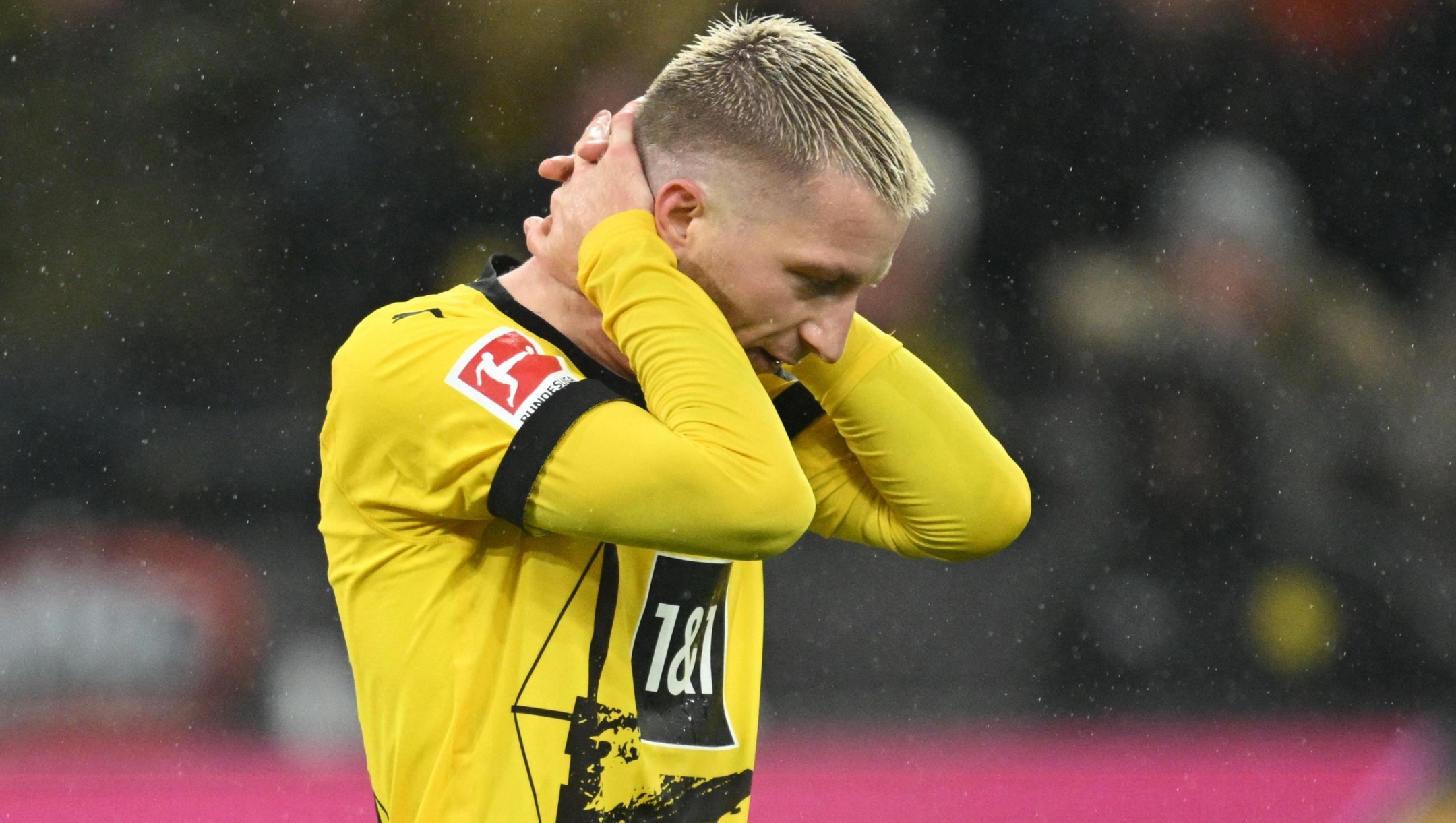 Dortmund's German forward #11 Marco Reus reacts after a missed attempt on goal during the German first division Bundesliga football match between BVB Borussia Dortmund and Borussia Moenchengladbach in Dortmund, western Germany on November 25, 2023. (Photo by INA FASSBENDER / AFP) / DFL REGULATIONS PROHIBIT ANY USE OF PHOTOGRAPHS AS IMAGE SEQUENCES AND/OR QUASI-VIDEO