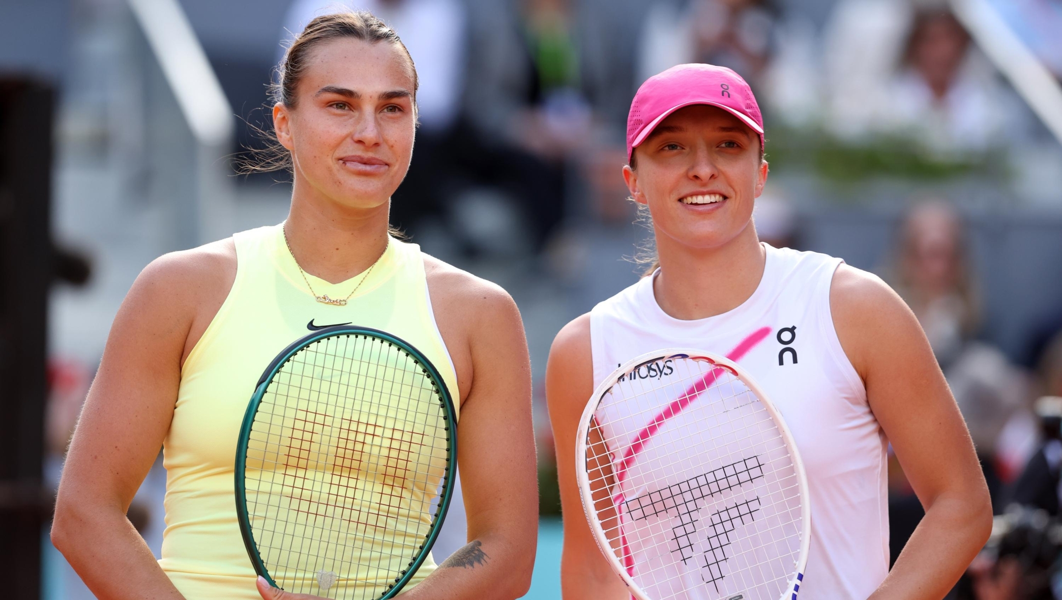 MADRID, SPAIN - MAY 04: Aryna Sabalenka of Belarus and Iga Swiatek of Poland meet at the net prior to the Women's Singles Final match on Day Twelve of Mutua Madrid Open at La Caja Magica on May 04, 2024 in Madrid, Spain.  (Photo by Julian Finney/Getty Images)