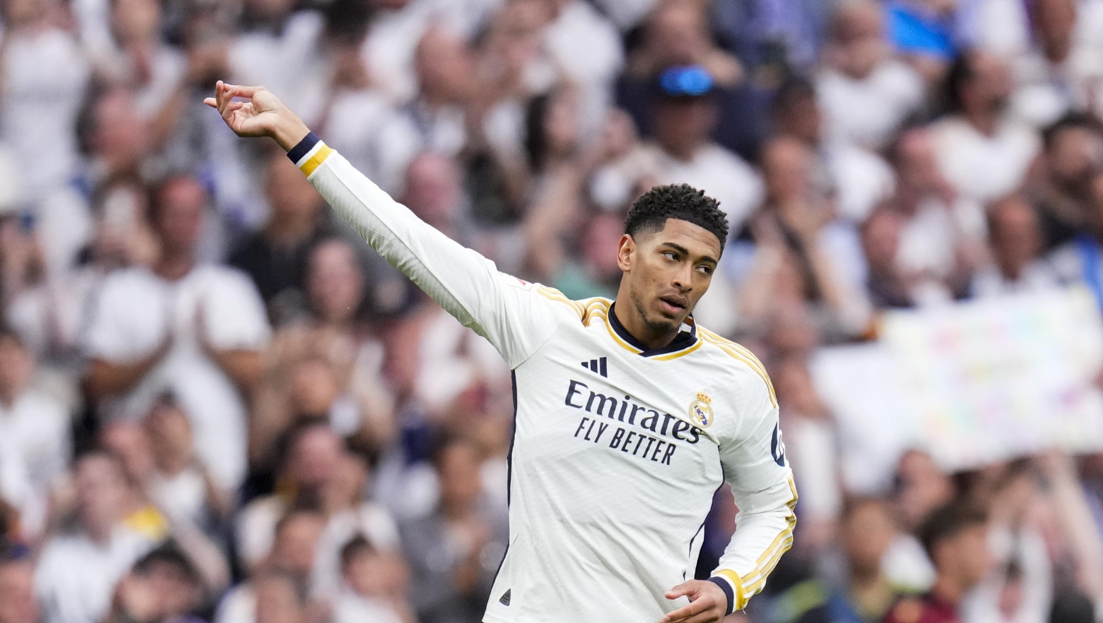 Real Madrid's Jude Bellingham celebrates after scoring his side's second goal during the the Spanish La Liga soccer match between Real Madrid and Cadiz at the Santiago Bernabeu stadium in Madrid, Spain, Saturday, May 4, 2024. (AP Photo/Manu Fernandez)