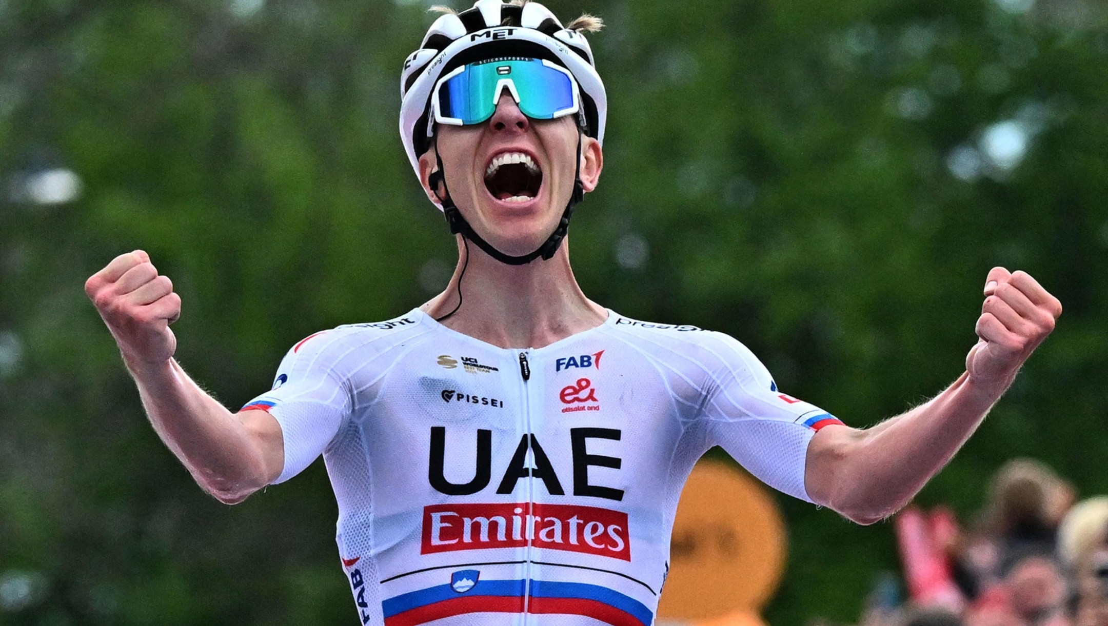 Slovenian rider Tadej Pogacar of Uae Team Emirates celebrates after win the first 2th stage of the Giro d'Italia 2024 161km cycling race from San Francesco al Campo to Santuario di Oropa (Biella), Italy, 05 May 2024. ANSA/LUCA ZENNARO