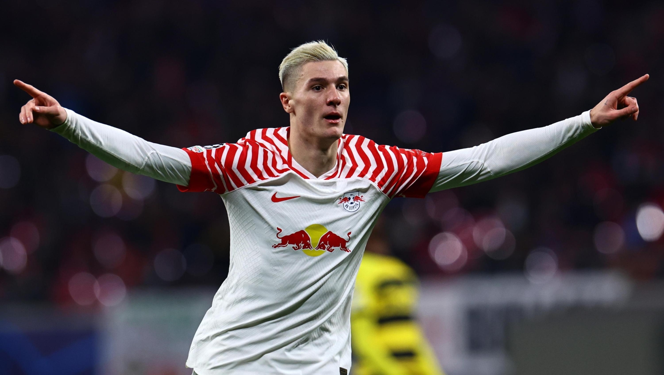 epa11027366 Leipzig's Benjamin Sesko celebrates after scoring the 1-0 goal during the UEFA Champions League group G soccer match between RB Leipzig and BSC Young Boys, in Leipzig, Germany, 13 December 2023.  EPA/FILIP SINGER