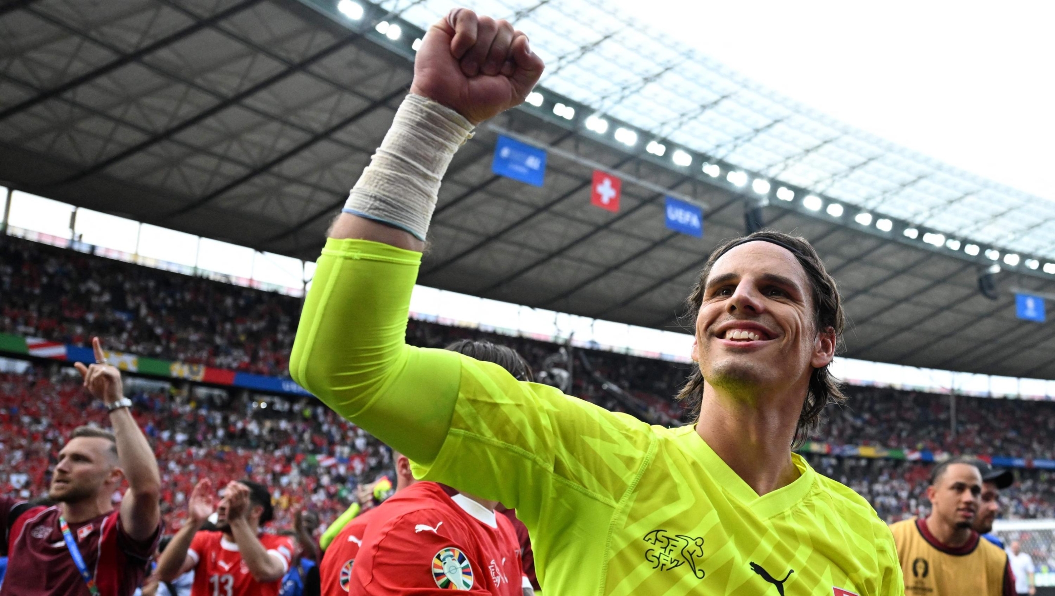 Switzerland's goalkeeper #01 Yann Sommer celebrates after winning the UEFA Euro 2024 round of 16 football match between Switzerland and Italy at the Olympiastadion Berlin in Berlin on June 29, 2024. (Photo by Kirill KUDRYAVTSEV / AFP)
