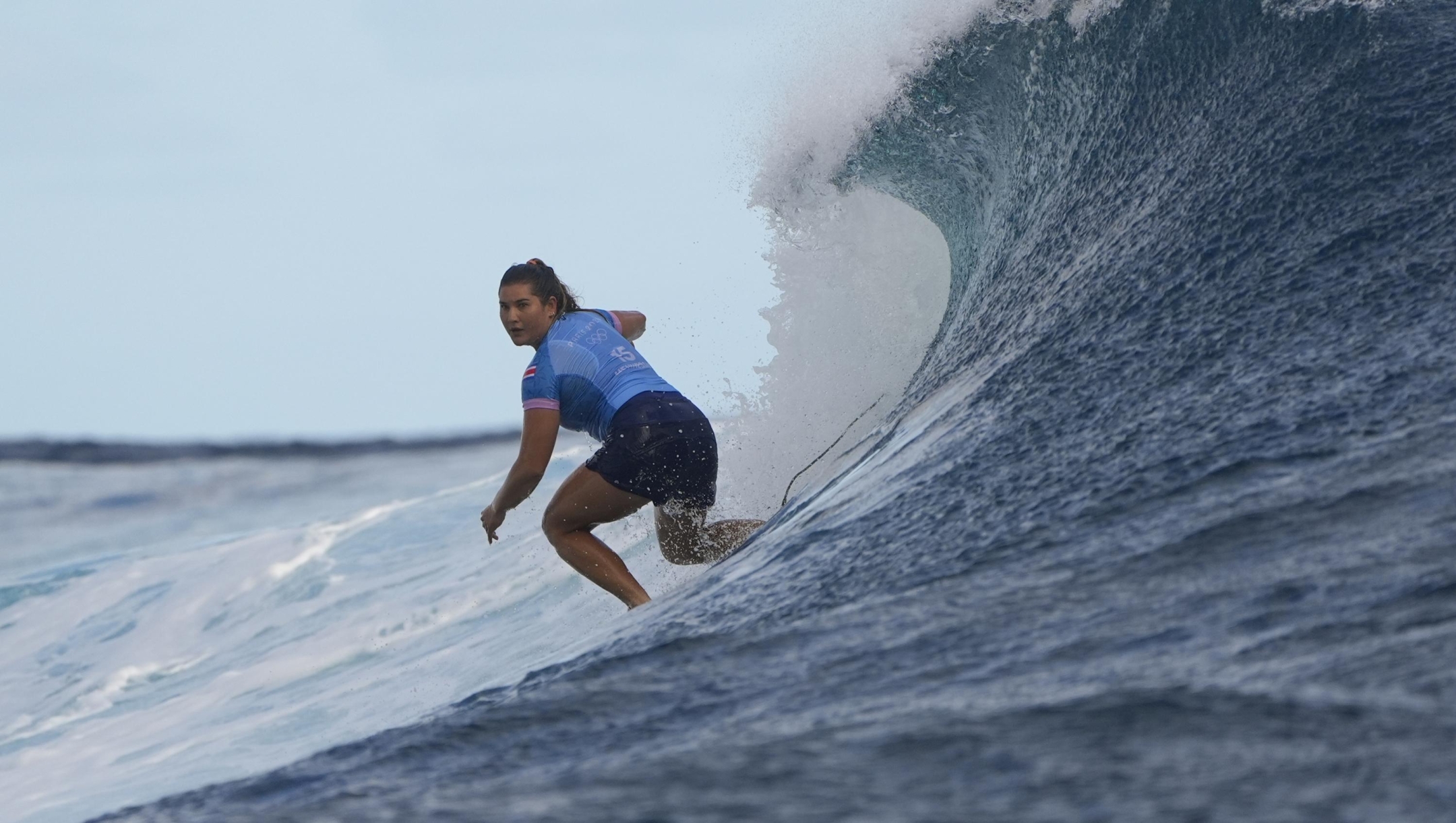 Brisa Hennessy, of Costa Rica, surfs during the quarterfinals round of the 2024 Summer Olympics surfing competition, Thursday, Aug. 1, 2024, in Teahupo'o, Tahiti. (AP Photo/Gregory Bull)