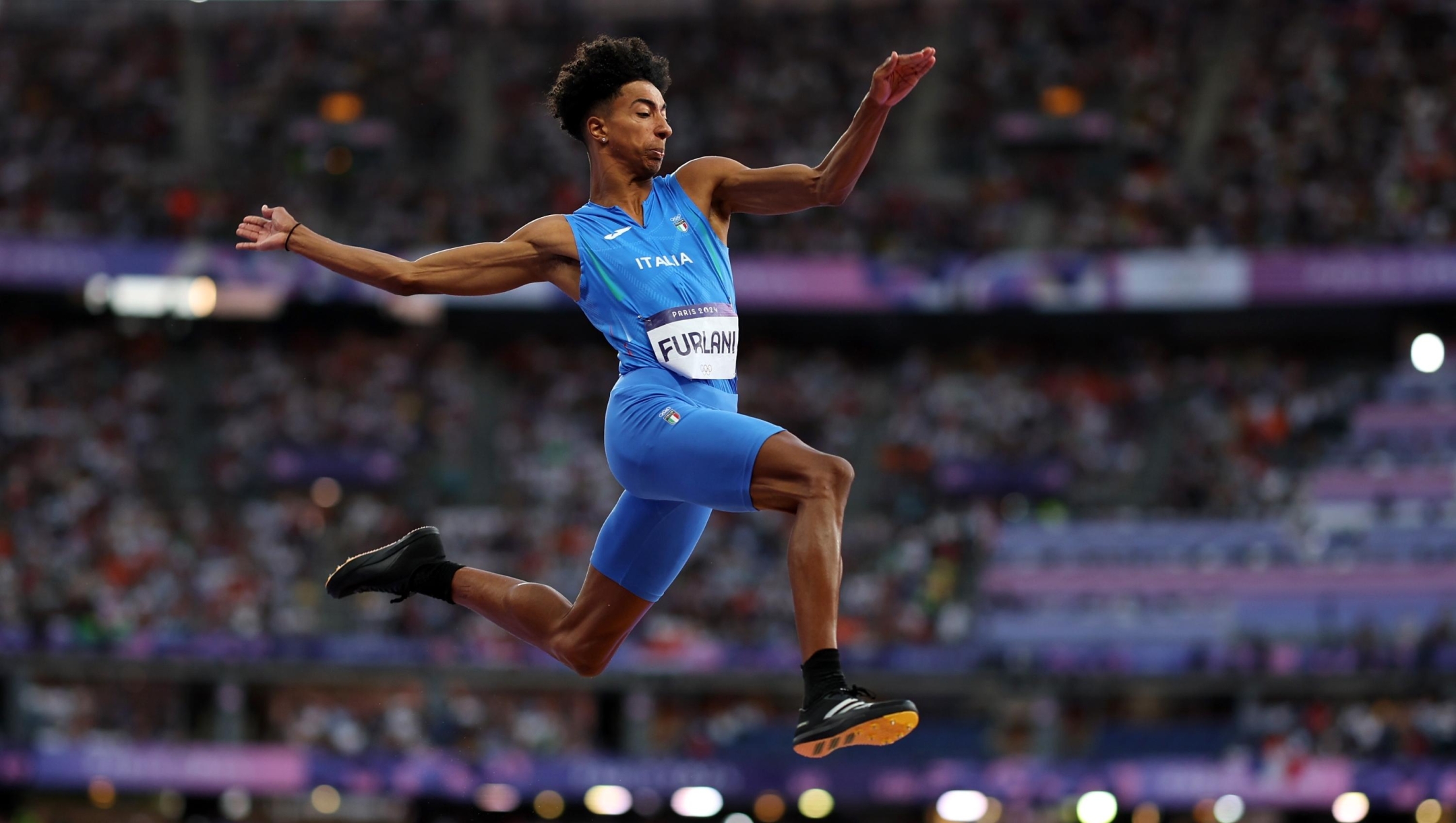 PARIS, FRANCE - AUGUST 06: Mattia Furlani of Team Italy competes during the Men's Long Jump Final on day eleven of the Olympic Games Paris 2024 at Stade de France on August 06, 2024 in Paris, France. (Photo by Cameron Spencer/Getty Images)