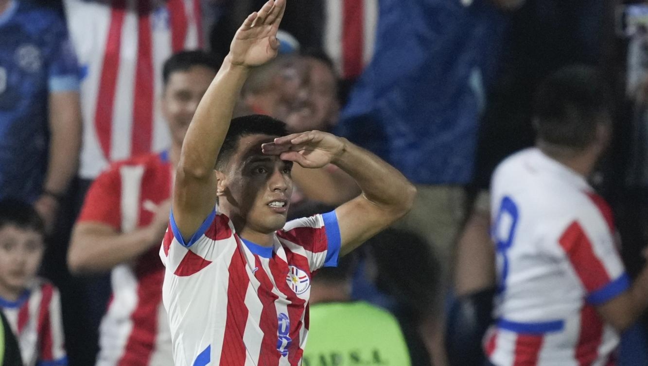 Paraguay's Diego Gomez celebrates scoring his side's opening goal against Brazil during a qualifying soccer match for the FIFA World Cup 2026 at the Defensores del Chaco Stadium, in Asuncion, Paraguay, Tuesday, Sept.10, 2024. (AP Photo/Jorge Saenz)