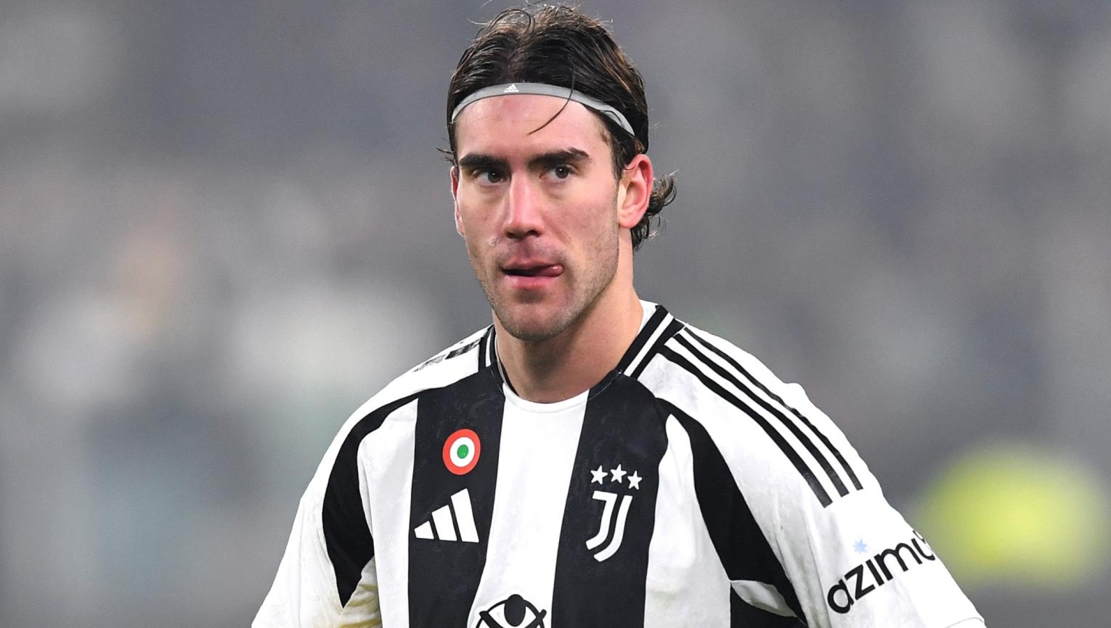 TURIN, ITALY - DECEMBER 14: Dusan Vlahovic of Juventus looks on before taking a penalty kick and scoring his team's second goal during the Serie A match between Juventus and Venezia at Allianz Stadium on December 14, 2024 in Turin, Italy. (Photo by Valerio Pennicino/Getty Images)