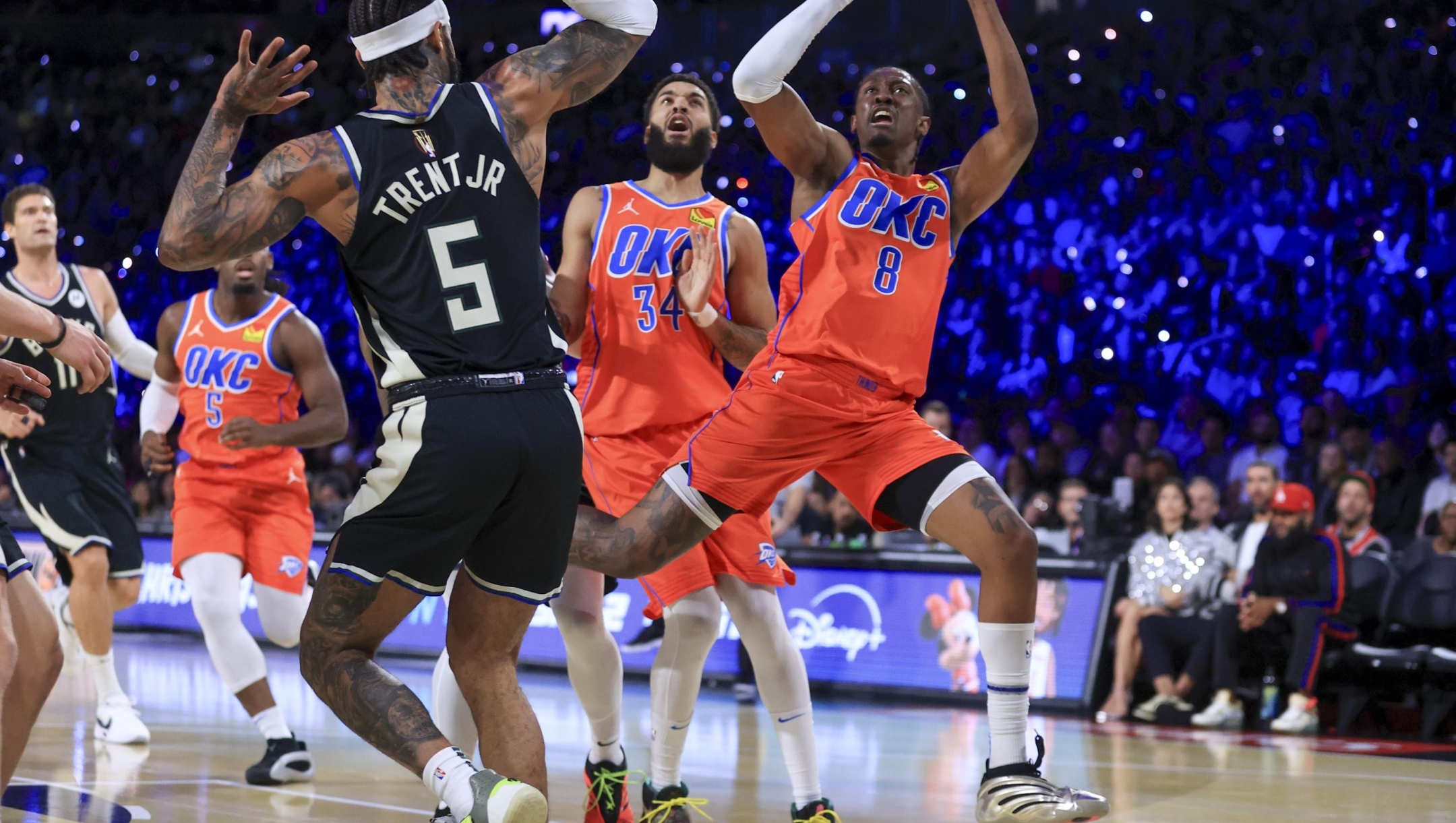 Oklahoma City Thunder forward Jalen Williams (8) shoots against Milwaukee Bucks guard Gary Trent Jr. (5) during the first half of the championship game in the NBA Cup basketball tournament Tuesday, Dec. 17, 2024, in Las Vegas. (AP Photo/Ian Maule)