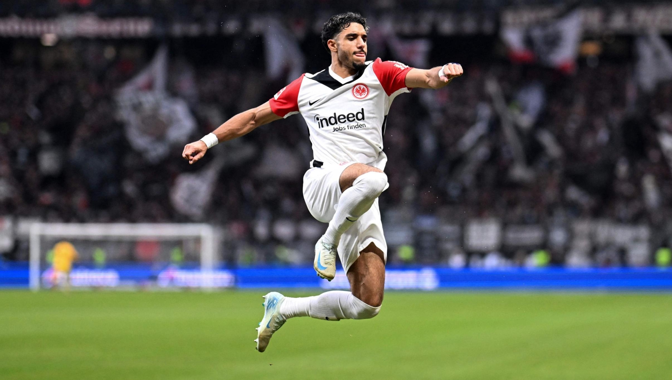 CORRECTION / Frankfurt's Egyptian forward #07 Omar Marmoush celebrates after scoring during the German first division Bundesliga football match between Eintracht Frankfurt and VfL Bochum in Frankfurt am Main, western Germany, on November 2, 2024. (Photo by Kirill KUDRYAVTSEV / AFP) / DFL REGULATIONS PROHIBIT ANY USE OF PHOTOGRAPHS AS IMAGE SEQUENCES AND/OR QUASI-VIDEO / The erroneous mention[s] appearing in the metadata of this photo by Kirill KUDRYAVTSEV has been modified in AFP systems in the following manner: [Frankfurt's Egyptian forward #07 Omar Marmoush] instead of [Frankfurt's German forward #36 Ansgar Knauff]. Please immediately remove the erroneous mention[s] from all your online services and delete it (them) from your servers. If you have been authorized by AFP to distribute it (them) to third parties, please ensure that the same actions are carried out by them. Failure to promptly comply with these instructions will entail liability on your part for any continued or post notification usage. Therefore we thank you very much for all your attention and prompt action. We are sorry for the inconvenience this notification may cause and remain at your disposal for any further information you may require.