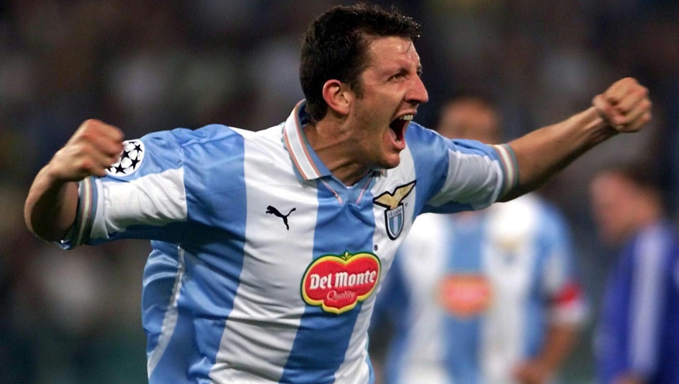 Lazio's Paolo Negro celebrates after scoring during the Champions League first round soccer match between Lazio of Rome and Dynamo Kiev at Rome's Olympic stadium, Wednesday, September 22, 1999. (AP Photo/Domenico Stinellis)