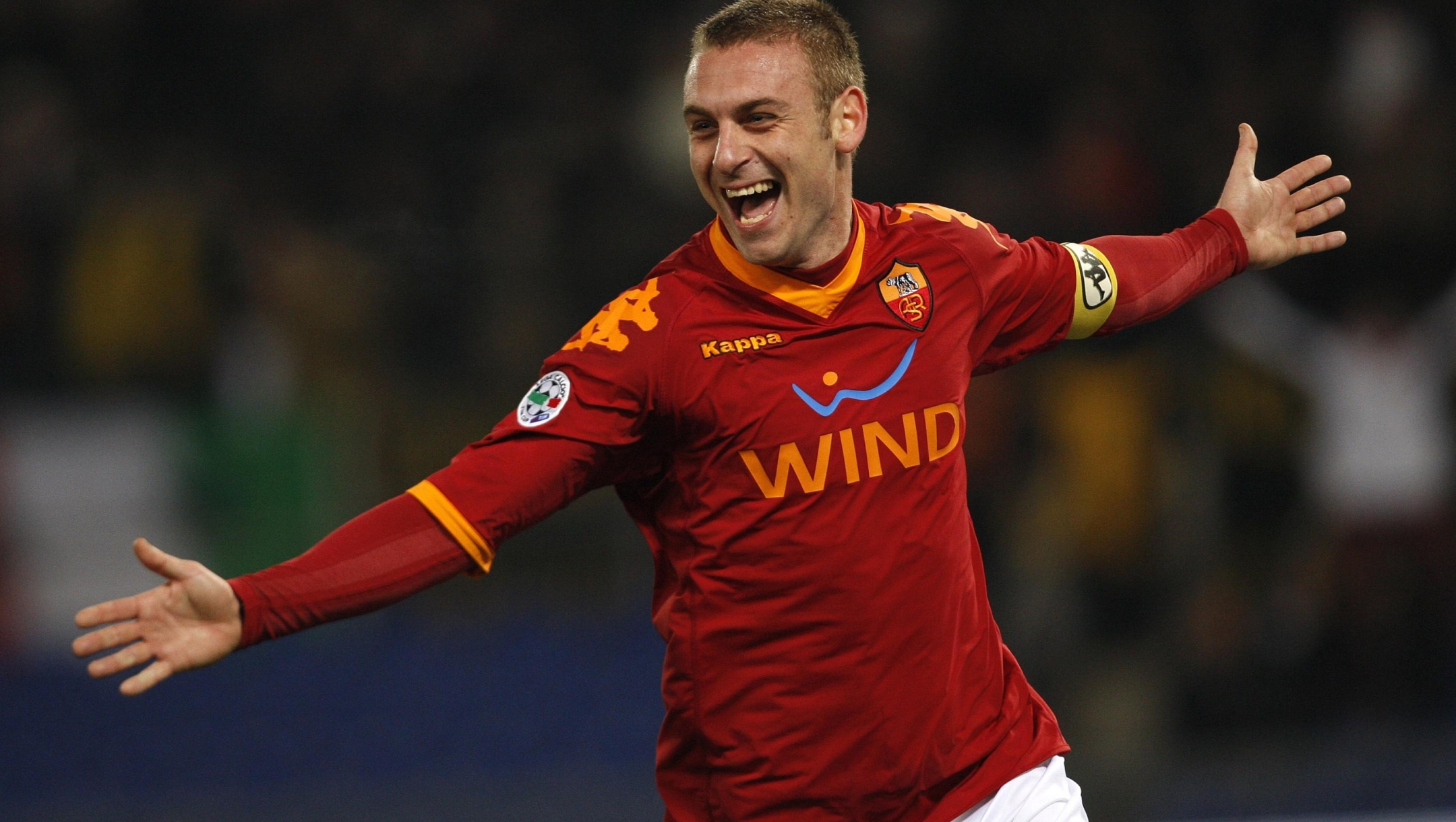AS Roma midfielder Daniele De Rossi celebrates after scoring during an Italian Cup, quarterfinal soccer match between AS Roma and Catania at Rome's Olympic stadium, Tuesday, Jan. 26, 2010. (AP Photo/Alessandra Tarantino)