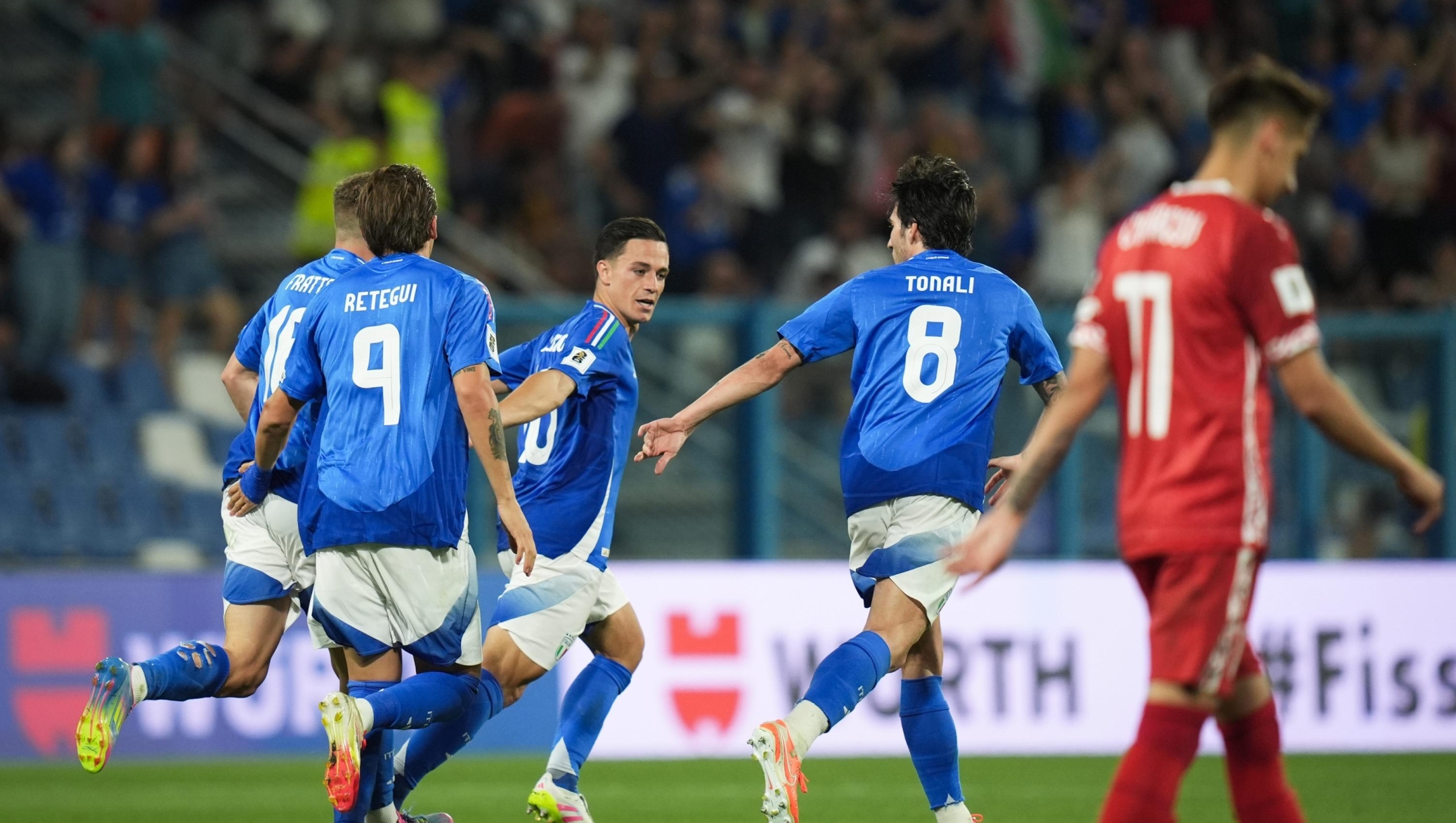 Italy's Giacomo Raspadori and Italy's Sandro Tonali celebrate after the 2-0 goal of Italy's Andrea Cambiaso during the Uefa European Qualifiers 2026 match between Italy and Moldova (group I) at the Mapei Stadium, Reggio Emilia, Italy - June 9, 2025. Sport - Soccer . (Photo by Massimo Paolone/LaPresse)