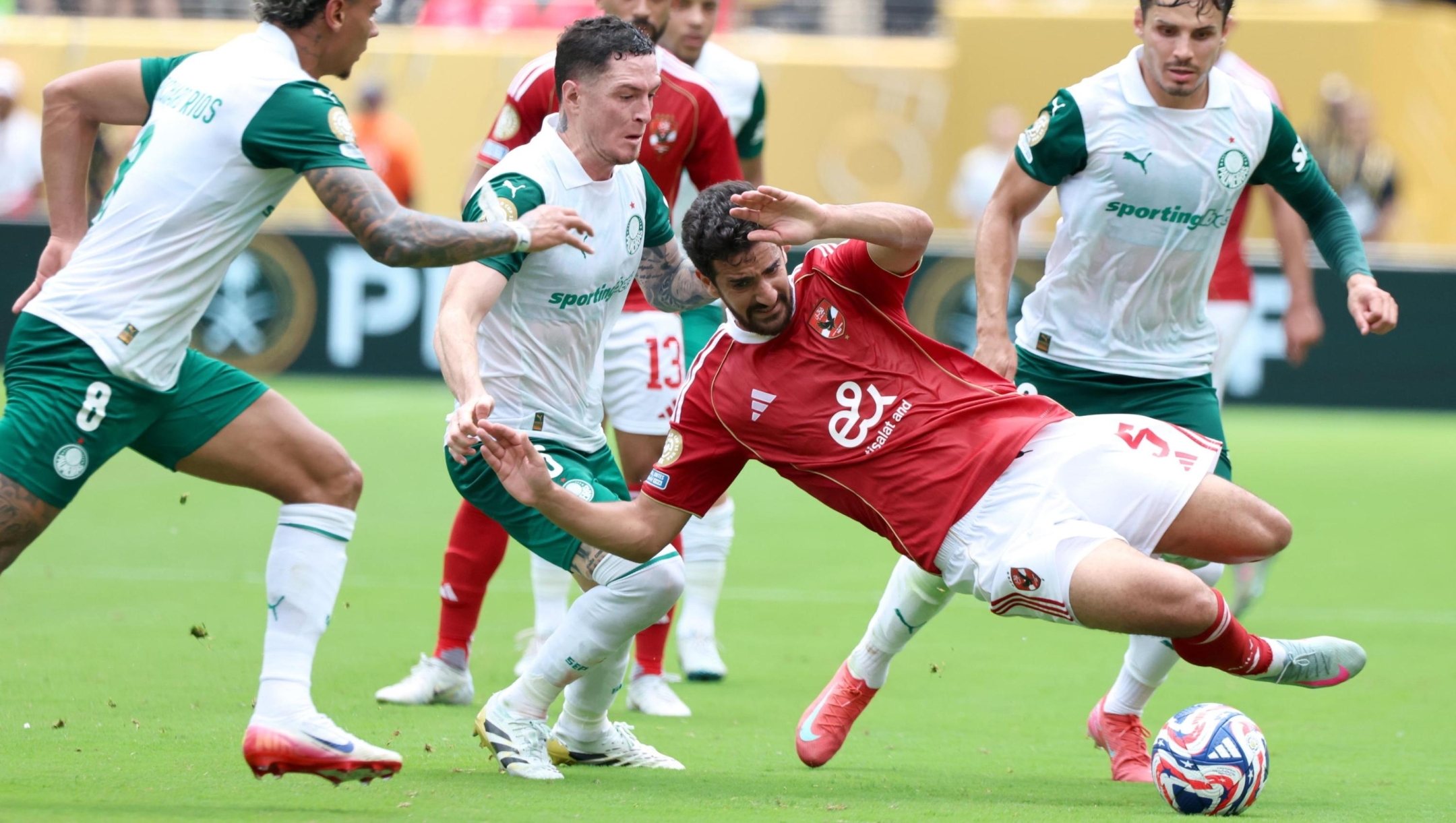 epa12185909 Richard Rios (L), Anibal Moreno and Raphael Veiga (R) of Palmeiras in action against Mohamed Ali Ben Romdhane (C) of Al Ahly during the FIFA Club World Cup 2025 match between Palmeiras and Al Ahly in East Rutherford, New Jersey, USA, 19 June 2025. EPA/JUSTIN LANE