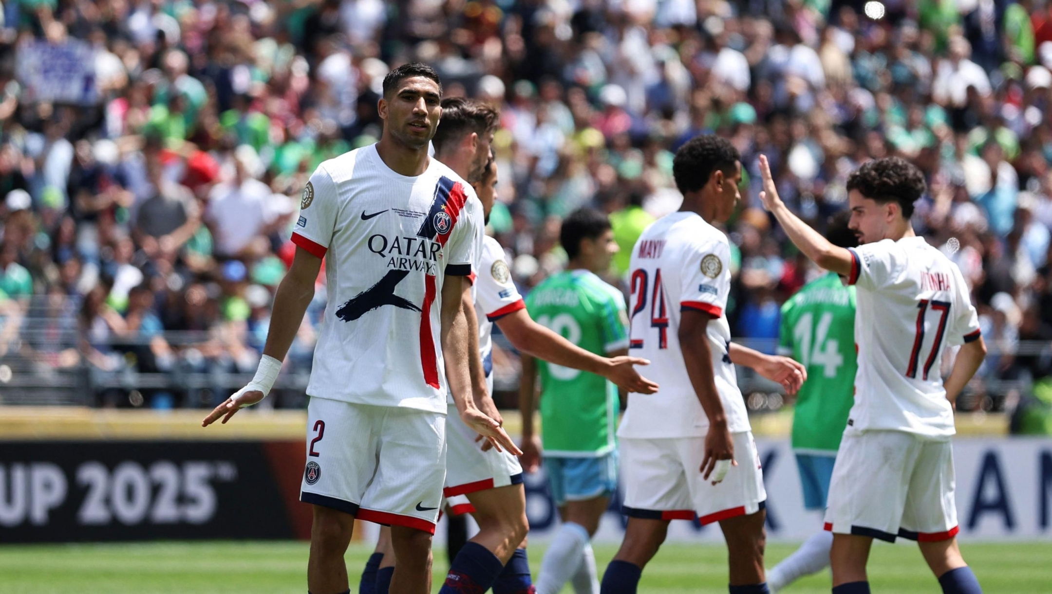 Achraf Hakimi #2 of Paris Saint-Germain celebrates scoring his team's second goal during the FIFA Club World Cup 2025 group B match between Seattle Sounders FC and Paris Saint-Germain FC at Lumen Field on June 23, 2025 in Seattle, Washington. Buda Mendes/Getty Images/AFP (Photo by Buda Mendes / GETTY IMAGES NORTH AMERICA / Getty Images via AFP)