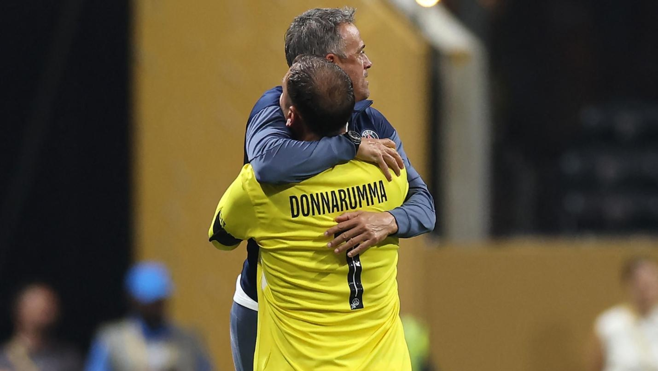 Luis Enrique, Head Coach of Paris Saint-Germain, celebrates with Gianluigi Donnarumma #1 during the FIFA Club World Cup 2025 quarter-final match between Paris Saint-Germain and FC Bayern München at Mercedes-Benz Stadium on July 05, 2025 in Atlanta, Georgia. Buda Mendes/Getty Images/AFP (Photo by Buda Mendes / GETTY IMAGES NORTH AMERICA / Getty Images via AFP)