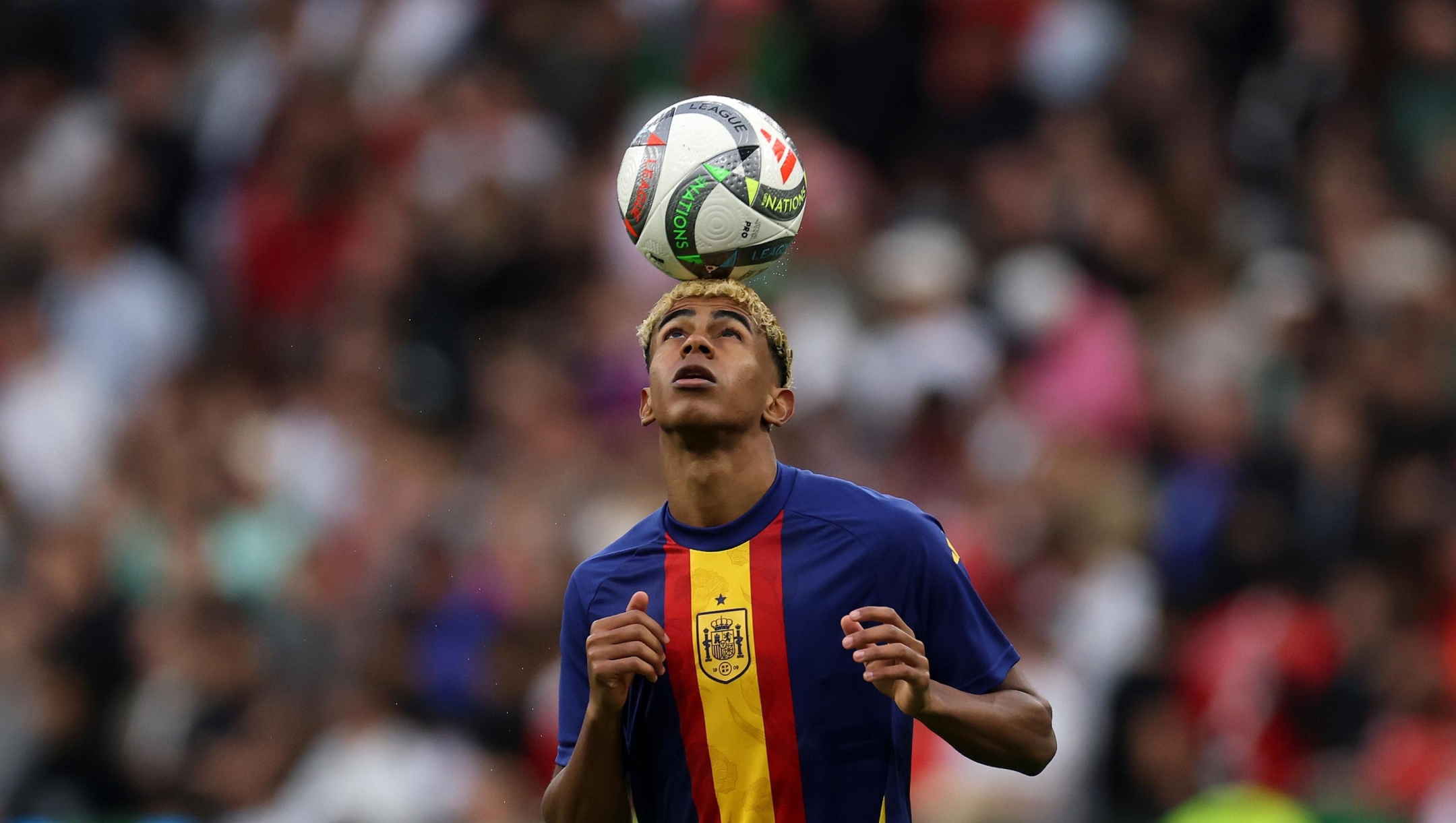 Lamine Yamal of Spain controls the ball during the warm up prior to the UEFA Nations League 2025 final match between Portugal and Spain at Munich Football Arena on June 08, 2025 in Munich, Germany. (Photo by Alexander Hassenstein/Getty Images)