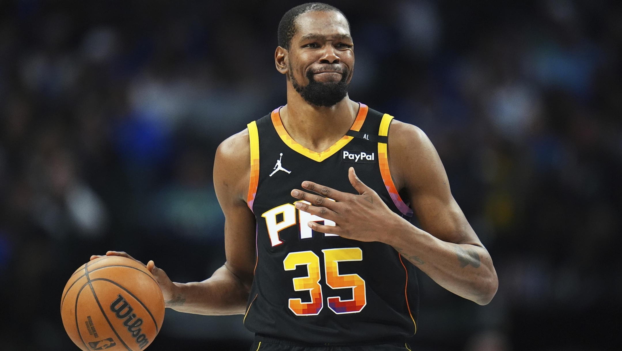 FILE - Phoenix Suns forward Kevin Durant gestures during the second half of an NBA basketball game on March 9, 2025, in Dallas. (AP Photo/Julio Cortez, File)